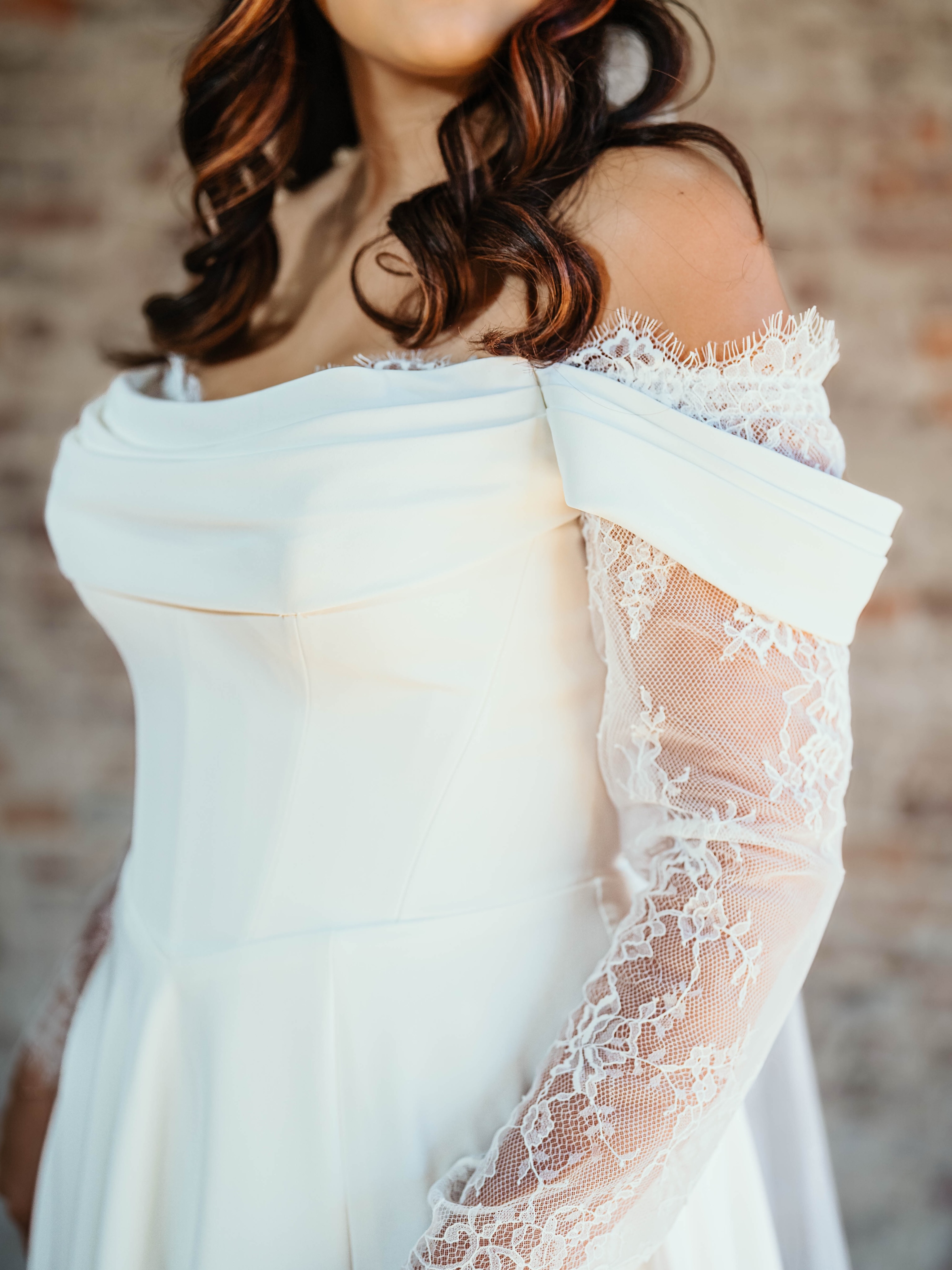 BACK IN STOCK 🤍
.
Trisha by @eddyk_bridal is back on our racks and we can’t be more happy! Look at her gorgeous lace lined slit! ✨
.
Book your appointment today by clicking the link in our bio 🔗
