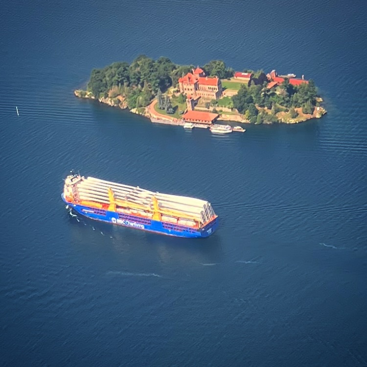 There’s something you don’t see everyday. Windmill blades making their way through the mighty St.Lawrence, weaving along by the castles.