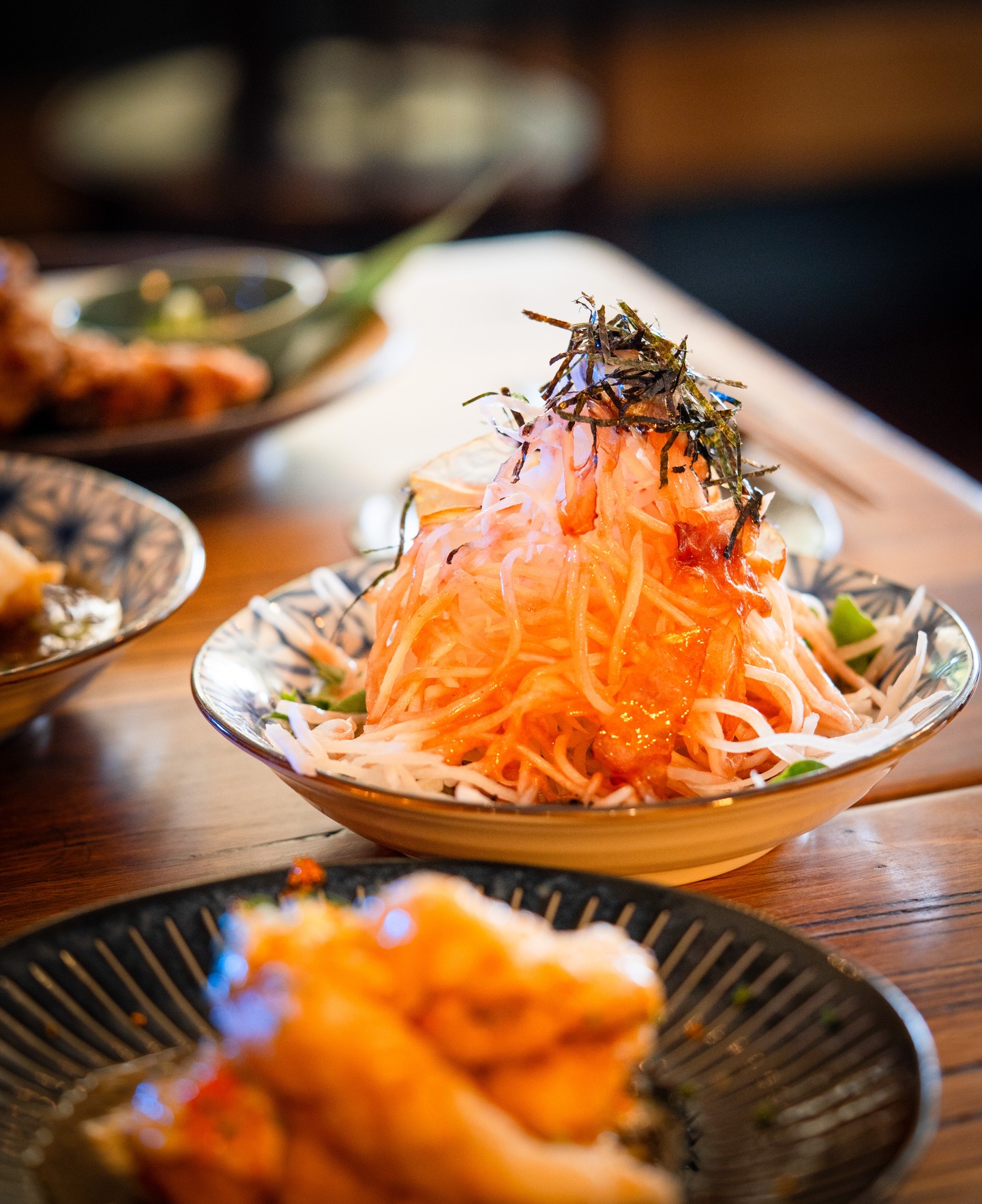 Daikon's refreshing crunch and flavour brings a delightful contrast to the tangy plum dressing and savoury bonito flakes in this Izakaya fave! 😋
Finished with a garnish of shredded nori, cos there’s no such thing as too much umami!
