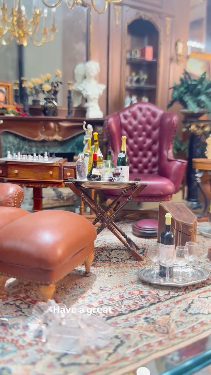 I wanted to share the latest shelf of dollhouse miniatures I'm working on curating which hopefully will one day become a full on roombox that has a whole bunch of little things that I adore including tufted leather chairs, sterling silver and of course drinks trays! #obsessed