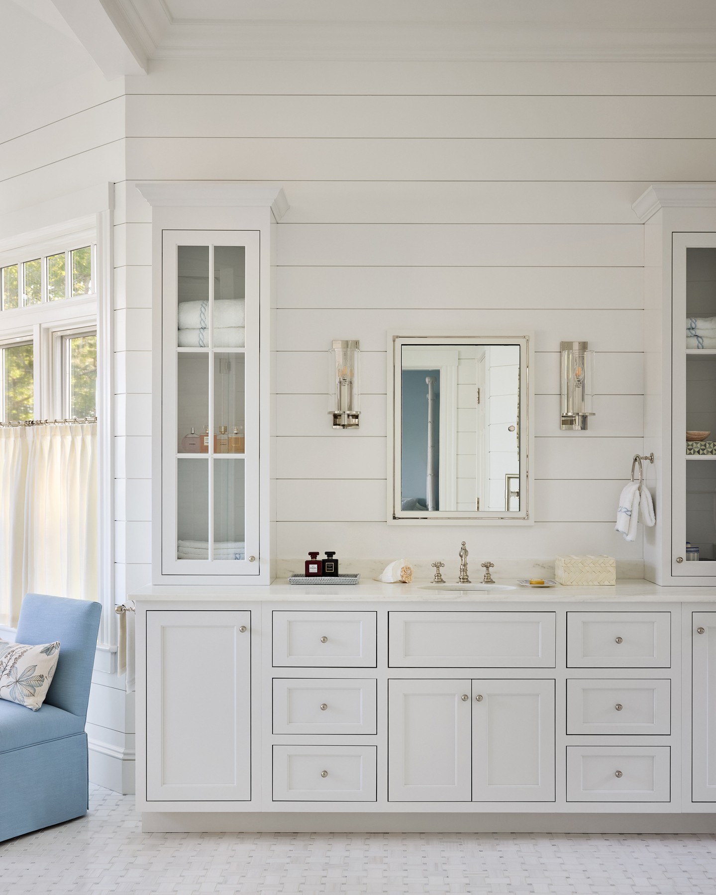 No two bathrooms in this Harwich Port renovation tell the same story. Each space was given its own distinctive character through custom cabinetry and millwork—from crisp inset vanities and louvered doors to soft coastal colors, tailored storage and carefully scaled trim. Curated by interior designer Ariel Okin, the combination of expressive patterns, refined materials and finely crafted details gives every bathroom a sense of individuality while maintaining a cohesive, elevated feel throughout the home.
Explore more of this major renovation on our website.
Interior Design: @arielokin
Photography: @donnadotanphoto
#CapeAssociates #HarwichPort #CapeCodRenovation #CustomCabinetry #CustomMillwork #BathroomDesign #LuxuryInteriors #InteriorCraftsmanship #CapeCodHomes #HomeRenovation