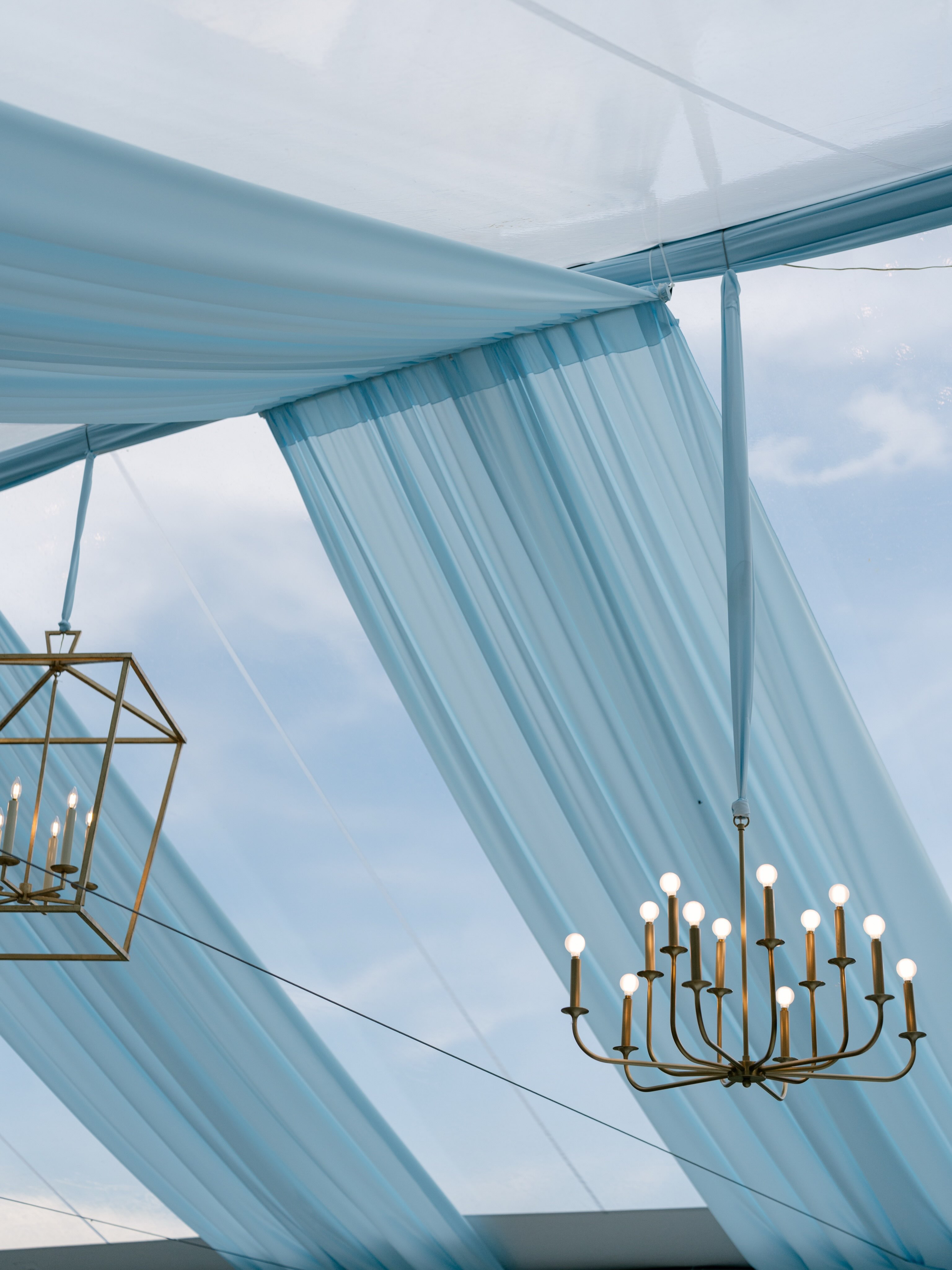 We have your ‘Something Blue’ and it’s even better than you’ve imagined!
Wedding tent draperys in the most gorgeous shades of 💙 are the kinds of detail that transform a celebration and give guests a moment they’ll never forget. Our team designs and installs tent drapery that doesn’t just dress a reception space, it defines it. And in blue? It’s absolutely show-stopping!
bit.ly/PartyTables #LinkInBio
Photography: @juliecatephoto @karajeanweddings
Planning & Design: @acharmingfete
Tent: @aablerents
Draping: @partytables_linensanddrapery
Location: @country_1889
Florals: @rosesforweddings
Rentals: @vastmadestudios @the1978collection @pompparties @borrow_curated @eliteweddingchairs
Linens: @nuagedesignsinc
Lighting: @limelightsentertain
#WeddingWednesday #WeddingReception #WeddingTent #TentDrapery