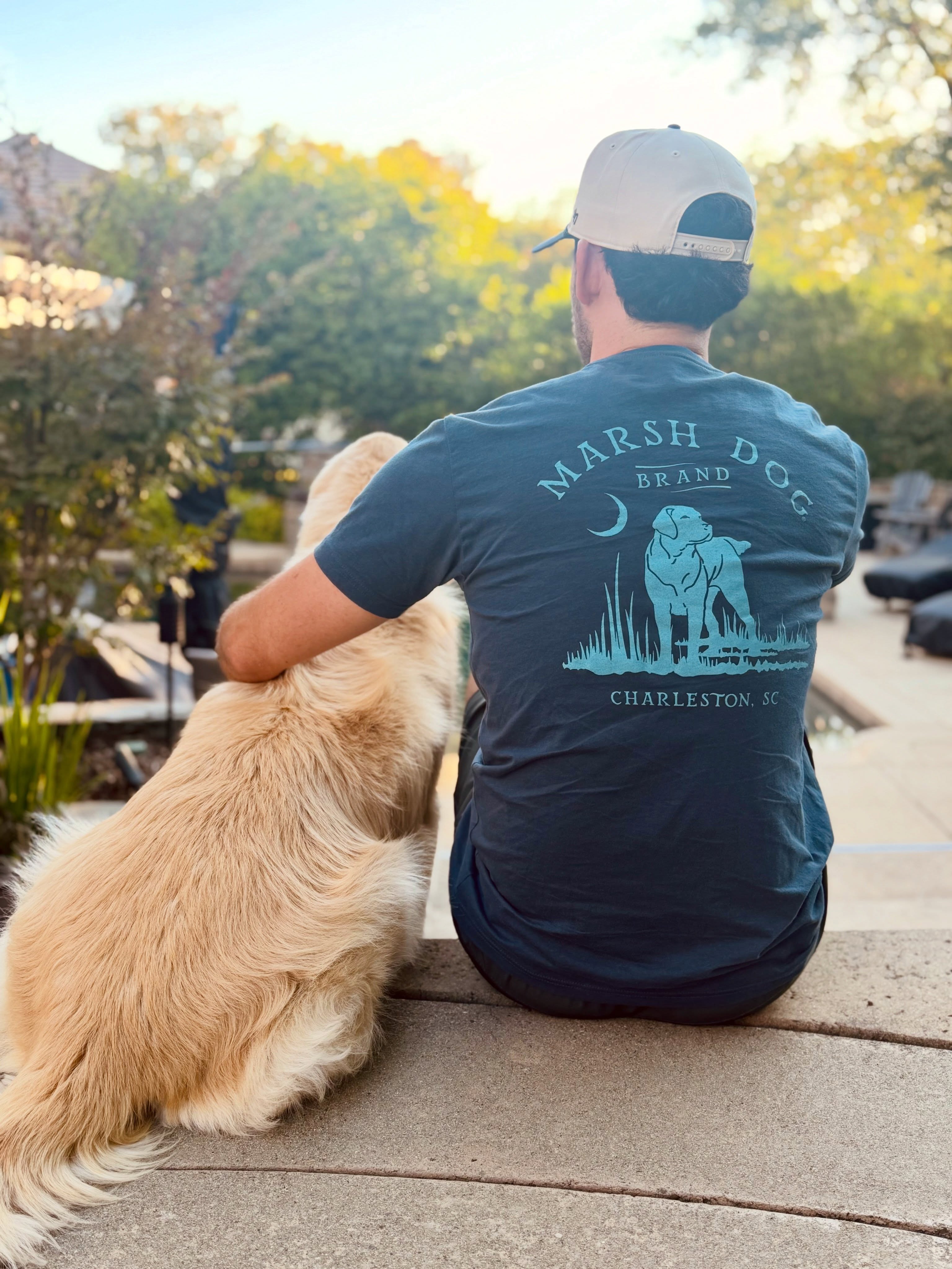 The best company comes with four legs. #marshdog @sweetgrassmercantile #charlestonsc