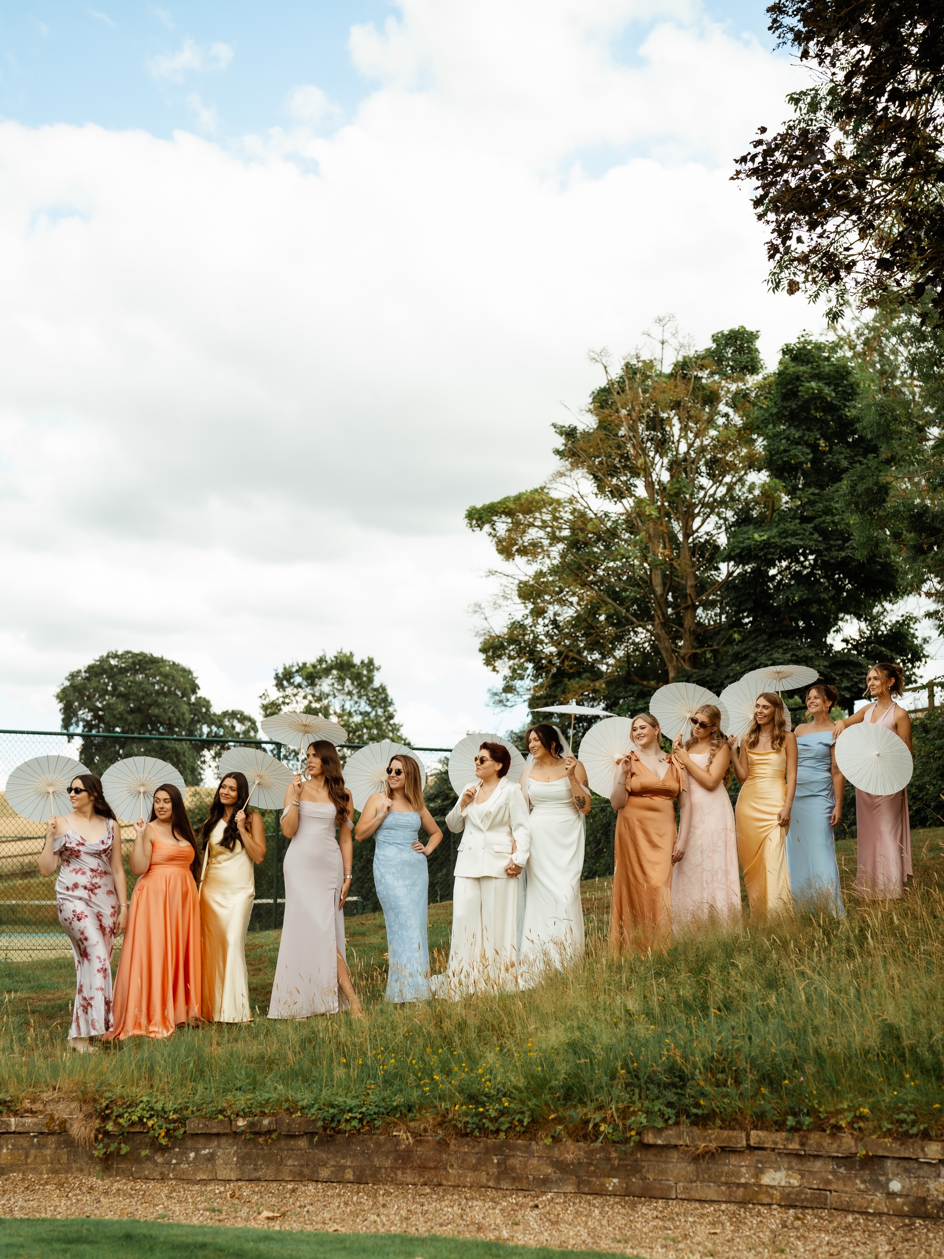 Laura (she/her) & Megan (she/her) had a colourful, high energy, good vibes kind of day 💛
When they cracked out the parasols during the drinks reception I knew there was a group photo that we just had to get, and they were sooo down for it! A perfect example of how your group photos can be fun and creative.
AND we managed to capture a bloody beautiful golden hour!
Suppliers from the day:
Photo - @rebelloveclub_
Cake - Moo Moo Cakes @moo_moo_cakes_suffolk
Harpist - Valeria Clarke @valeriaclarke.music
Violinist - Davina Clarke @davinaclarkeviolinist
Sax - Leanna @miss_leeloo_saxophonist
Venue @talboothhouseandspa @milsomweddings
Content Creator - Jasmin Clarke @jasminclarkecontent
DJ - Ross @rctevents
#lgbtqwedding #lgbtqweddingphotographer #weddinggroupphotos