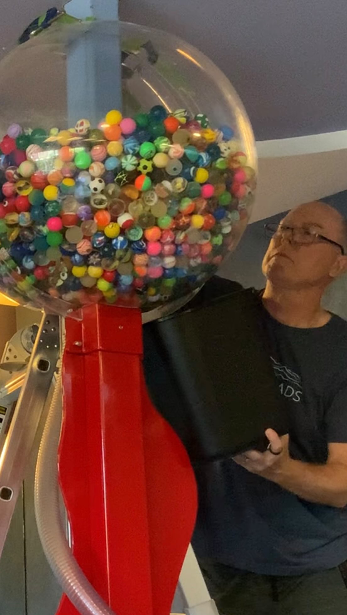 Every office has a hero. Ours happens to be 6’ something.
You may only see one minute of fun, but behind the scenes it took hours (and one very patient John) to rescue hundreds of runaway bouncy balls and get our prize machine back up and running.
The good news? It’s officially back in business.
That means it’s time to schedule your child’s cleaning, earn a token, and pick out a favorite bouncy ball. We’d say they’re worth the wait… but we’d rather not spend another five hours chasing them around the office.
See you at your next visit!
#PediatricDentistry #DentalOfficeLife #BehindTheScenes #MarinKids #OfficeHumor