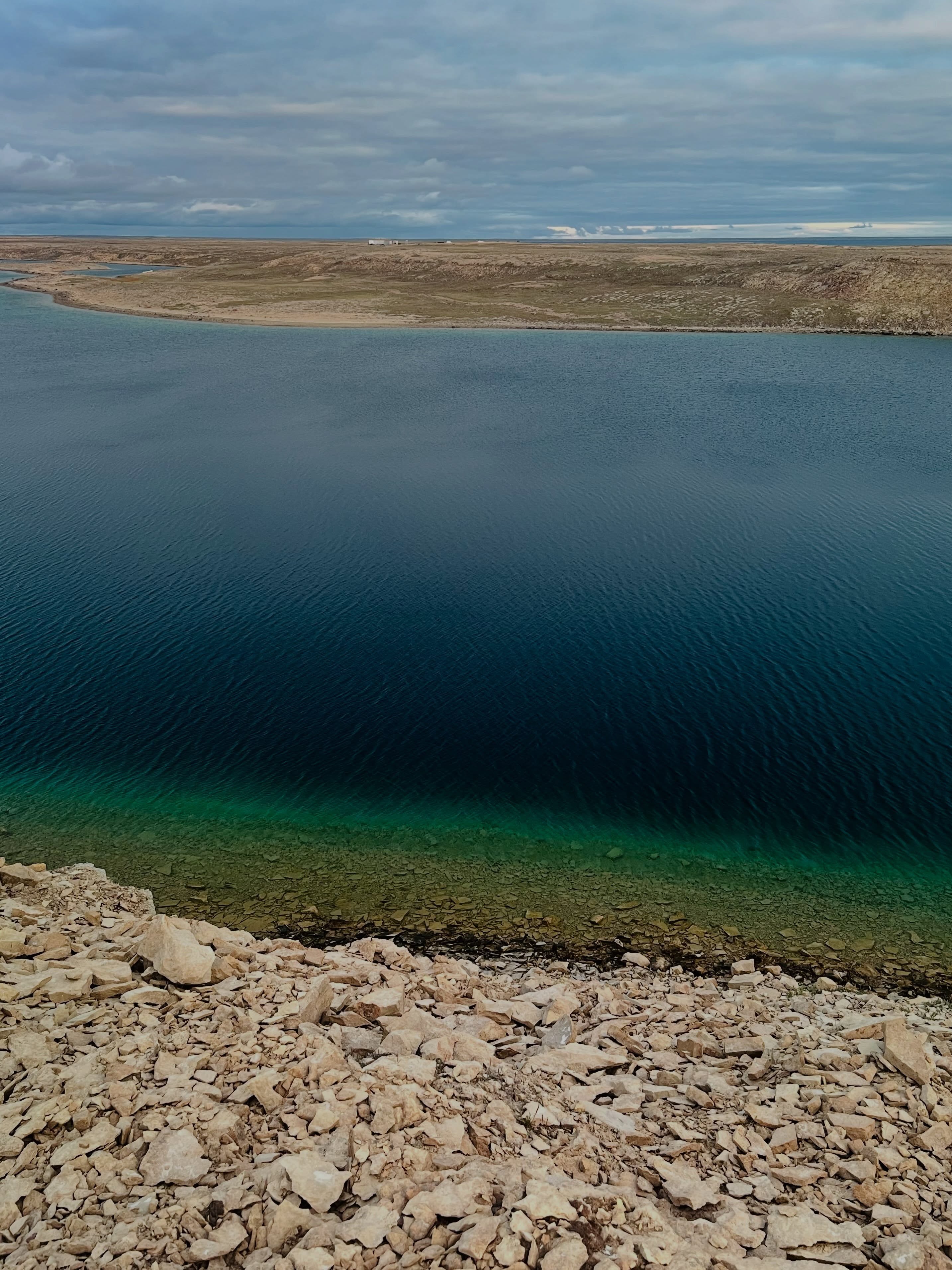 Week 1 of fieldwork in Cambridge Bay, Nunavut! ❄️🎣
After a few delays due to strong winds and some boat engine troubles, we’re finally back on track! We managed to complete our sampling at both Greiner Lake and Pelly Lake, except for the fish, which are proving a little harder to catch this year. 👀
According to several Elders in the community, summer arrived early and has been unusually dry. We can see signs of these changing conditions across the landscape: water levels are low in the rivers where Arctic char normally return to the lakes, and many ponds have already dried up. Elders have also noticed that fish seem skinnier this year, with relatively empty stomachs and more whitefish being caught compared with the Arctic char that are usually preferred.
These observations are important pieces of the puzzle as we work to better understand how a changing climate is affecting Arctic lake ecosystems and the fish and communities that depend on them.
Yesterday, the weather finally gave us a break, with almost no wind! 🌤️ We had the chance to bring two Elders from the community, Navalik and her friend Josie, out on the land. Despite a bumpy truck ride, they enjoyed the beautiful weather, relaxed by the lake, shared stories, and even helped us untangle a very stubborn rope! 😅
Quanaq both of you for your presence, stories and help.
A big thank you to Richards as well for helping us get the boat engines back in working order! 🙌
We’re now heading to Inuhotok Lake, where we’ll continue our sampling, and hopefully catch a few more fish for both our research and the community! 🎣