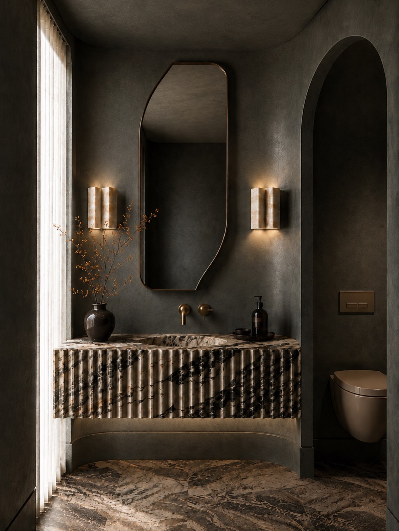Cliff Haus
.
A powder room designed as a moment of pure quiet luxury.
Rich textures create an intimate atmosphere, contrasted by dramatic natural stone and sculptural fluting of the vanity. Soft architectural lighting enhances the depth of each material, while the asymmetrical mirror and arched opening introduce a refined sense of softness and movement.
A compact space, elevated through materiality, proportion and detail.
#luxuryinterior #PowderRoomDesign #luxurybathroom #BathroomDesign #i̇nteriorarchitecture