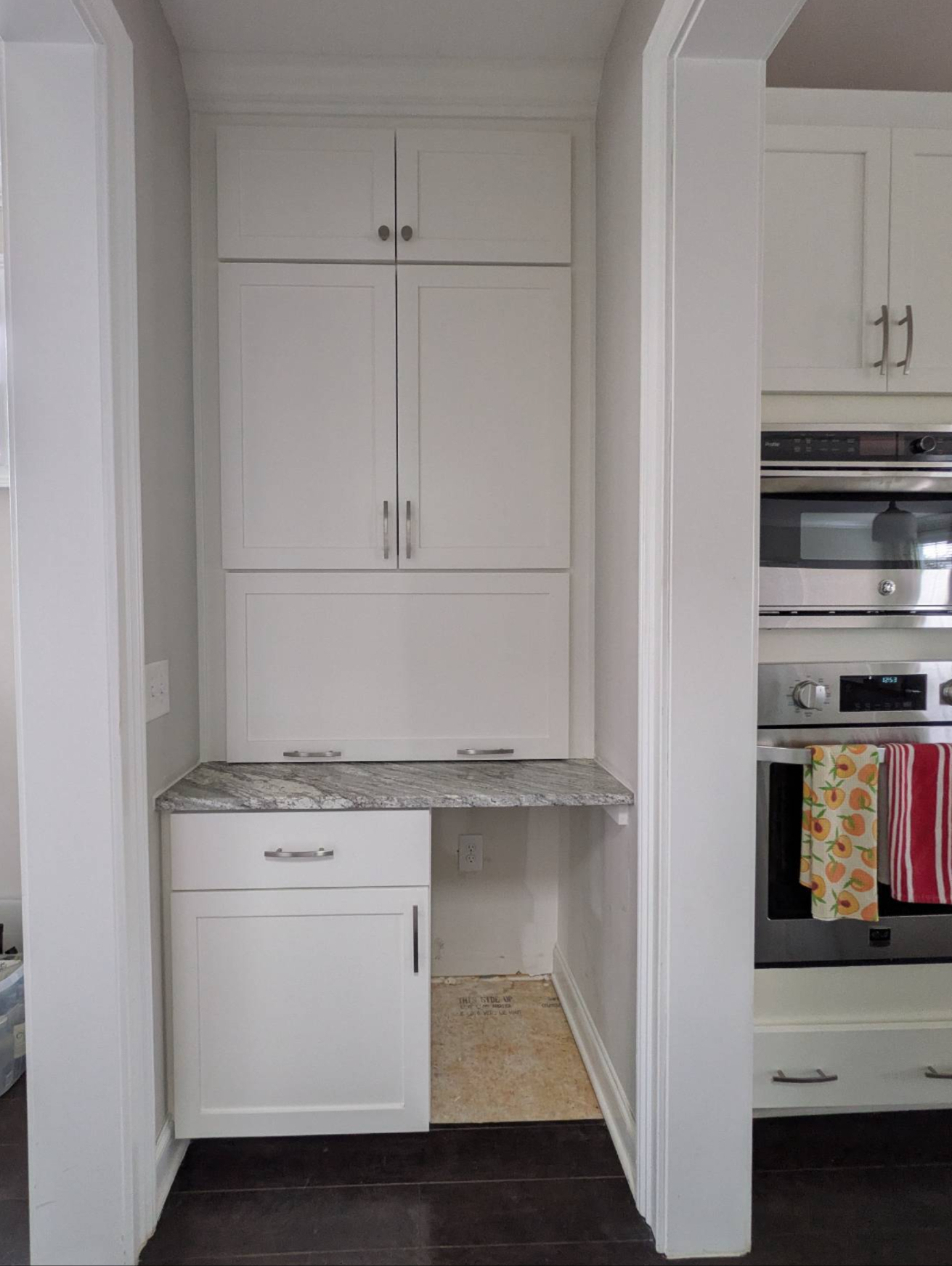 Hidden storage. Thoughtful design. Everyday convenience.
This custom butler's pantry was designed to keep everyday essentials organized, accessible, and neatly tucked away.
The standout feature? An appliance garage with a flipper door that opens to reveal a dedicated workspace with built-in outlets. Below, a rollout shelf brings frequently used items forward for easier access while keeping everything neatly organized. The open lower space was intentionally designed for a future mini refrigerator, creating a dedicated beverage station that's ready to complete the space.
Finished in Sherwin-Williams Westhighland White, this custom nook proves that thoughtful storage can be just as beautiful as it is practical.
Because great design isn't just about adding storage—it's about making everyday routines feel effortless.
#ButlersPantry #CustomCabinetry #ApplianceGarage #KitchenDesign #HomeOrganization #WesthighlandWhite #CustomStorage #BuiltIns #Craftsmanship