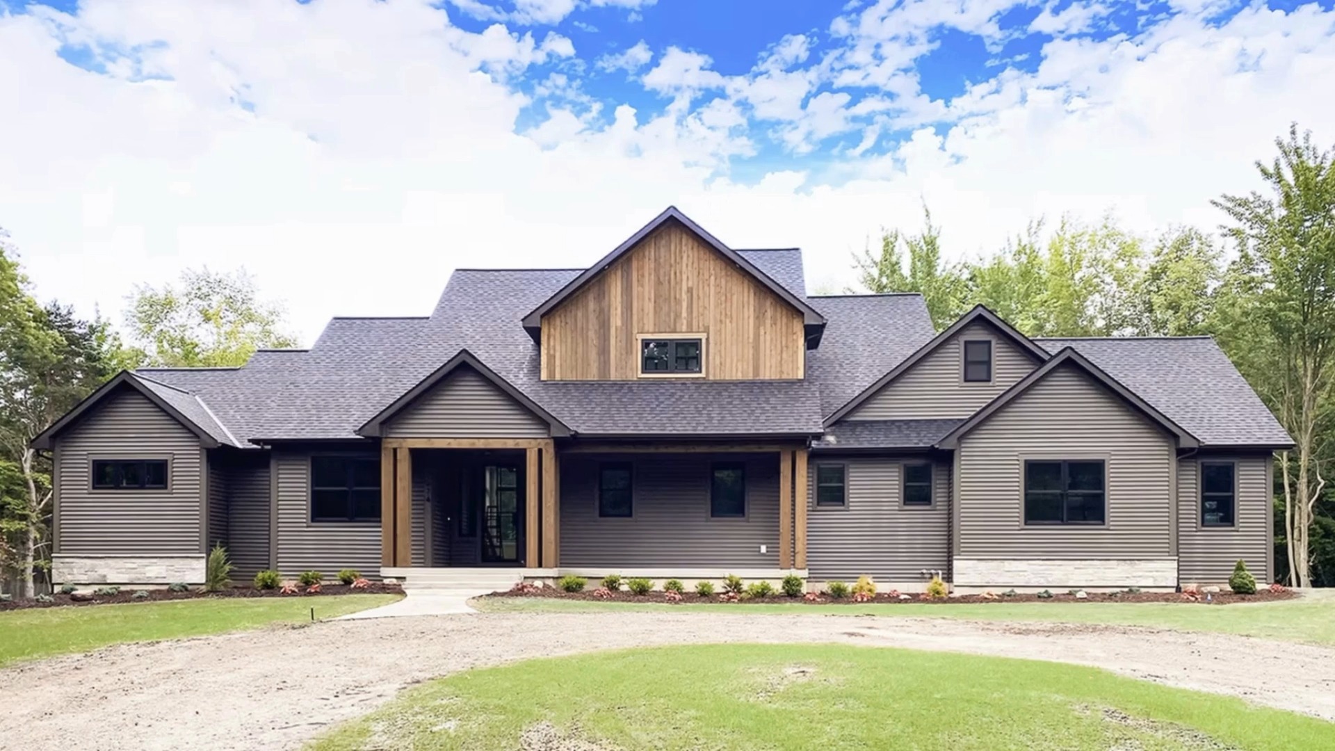 Forest living meets luxury in this #westmichiganlakeshore #customhome designed to harmonize serenity with its natural surroundings. Built by Flyway Builders ๐ Connect in the link in bio