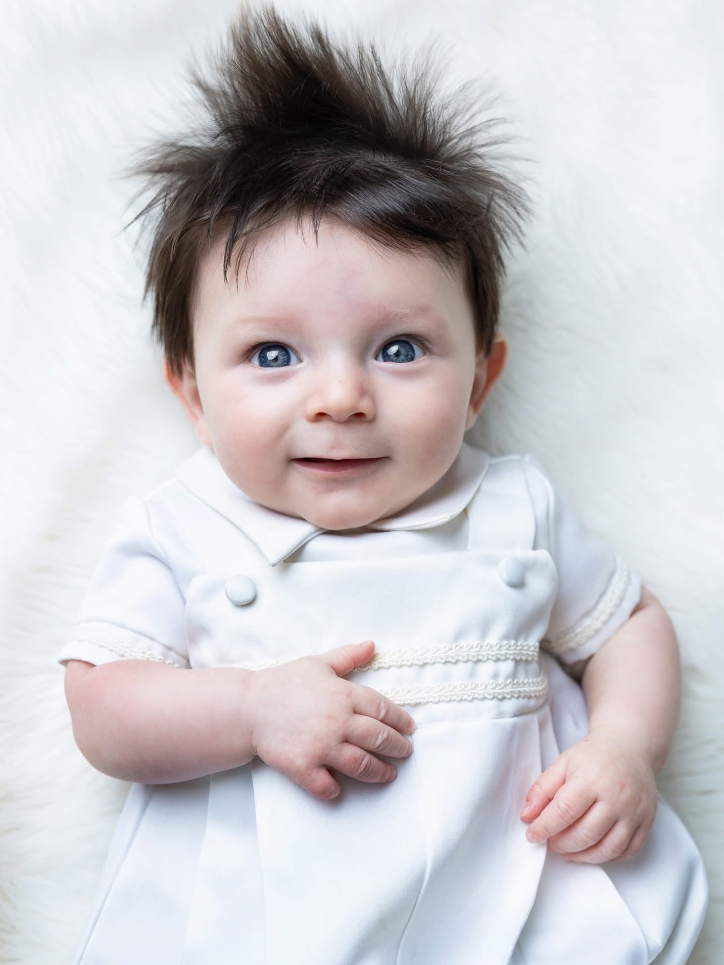 It was too hard to pick a favorite of John Paul in his baptism outfit. He is such a sweet, sweet little guy!
This is a great time for me to mention that if you are looking for a photography service that’s not listed on my website (such as: just a few shots to commemorate a baptism), please always ask! I am happy to customize a package for your needs.