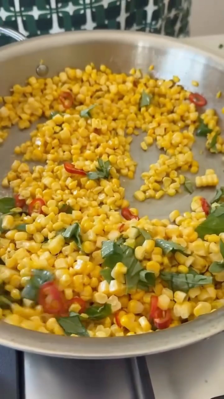CHARRED, BUTTERED & CRUNCHY CORN 🌽
Basically, corn three ways. A meditation on the season where, yet again, few ingredients and minimal work, yield massive flavor and joy on the plate. I’d have to put sweet summer corn in my top three, and here I both char it and cream it before topping with crunchy corn nut snacks. (Who didn’t love those as a child?) Give this a whirl and let me know what you think, and HAPPY CORN SEASON!
3 to 4 TB butter
1 red or green jalapeño, finely diced
6 ears fresh, sweet corn
¼ cup chopped basil
¼ tsp kosher salt, plus more for seasoning
1 cup half and half or coconut milk
1 TB olive oil
⅓ cup corn nuts, smashed
Cut the corn kernels off of 4 ears of corn. Heat a large skillet over high heat. Add butter and let brown, about 2 minutes. Reduce the heat to medium, add the jalapeño and cook 1 minute. Stir in the corn kernels, reduce the heat to medium-low and cook, covered, 5 minutes. Uncover and stir in basil and a pinch of salt. Cover to keep warm.
Heat a grill or grill pan on high over high these and grill the remaining 2 ears of corn, turning occasionally, until lightly charred, 7 to 8 minutes total. Cool slightly; cut kernels from cobs. Combine the charred corn, half and half, salt and olive oil in a medium bowl and blend with a hand mixer until smooth.
Layer the charred creamed corn on the bottom of a serving platter. Top with the buttered corn, then with the corn nuts.
