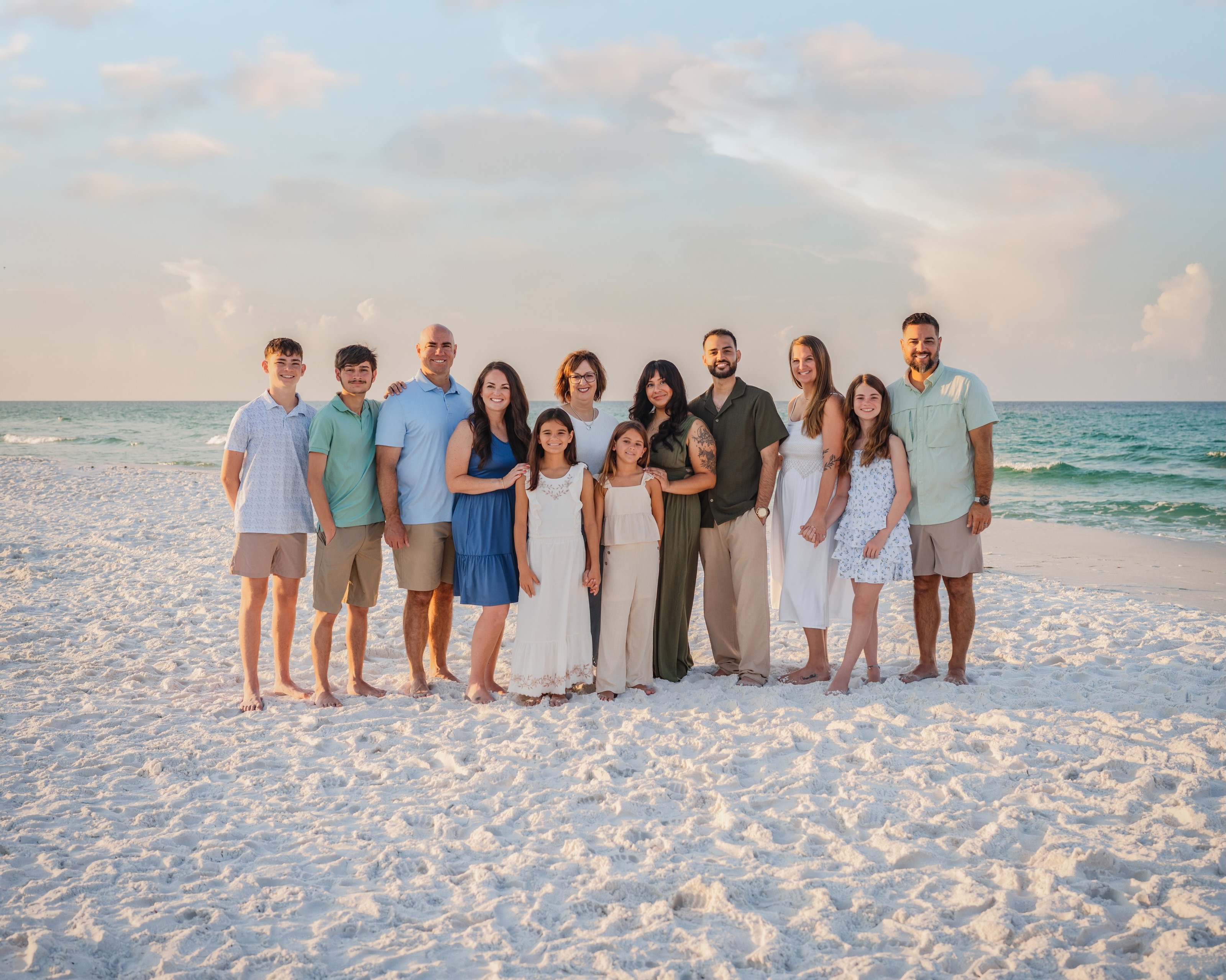 **Photog Fam Feature**
This Miramar Beach morning started with a bold sunrise and then gave us the loveliest surprise when a giant cloud softened everything.
One of my favorite things about photographing extended families is getting to see all the relationships inside the big picture.
There is the grandmother watching everyone she loves standing in one place.
There are adult siblings who have years of shared history between them.
There are cousins making their own memories now.
And there are parents who know exactly how quickly all of this changes.
Some families come to the beach for the water.
Some come for the sunshine.
And some somehow manage to bring three generations together from different parts of Texas, which feels worthy of a celebration all by itself.
From big family portraits to cousins being silly to Grammy splashing in the Gulf with her grand-(not so baby)-babies, this session had exactly what I love most: people enjoying each other.
Also, somewhere on this beach is a 14-year-old who deserves an award for enthusiastically participating in one of my more-for-younger-kids game ideas. 😂
He understood the assignment and delivered with graciousness. 👏🏼
This is the kind of session I hope becomes the first chapter of a very long photography friendship. 🩷
#MiramarBeachPhotographer #DestinFamilyPhotographer #ExtendedFamilyPhotos