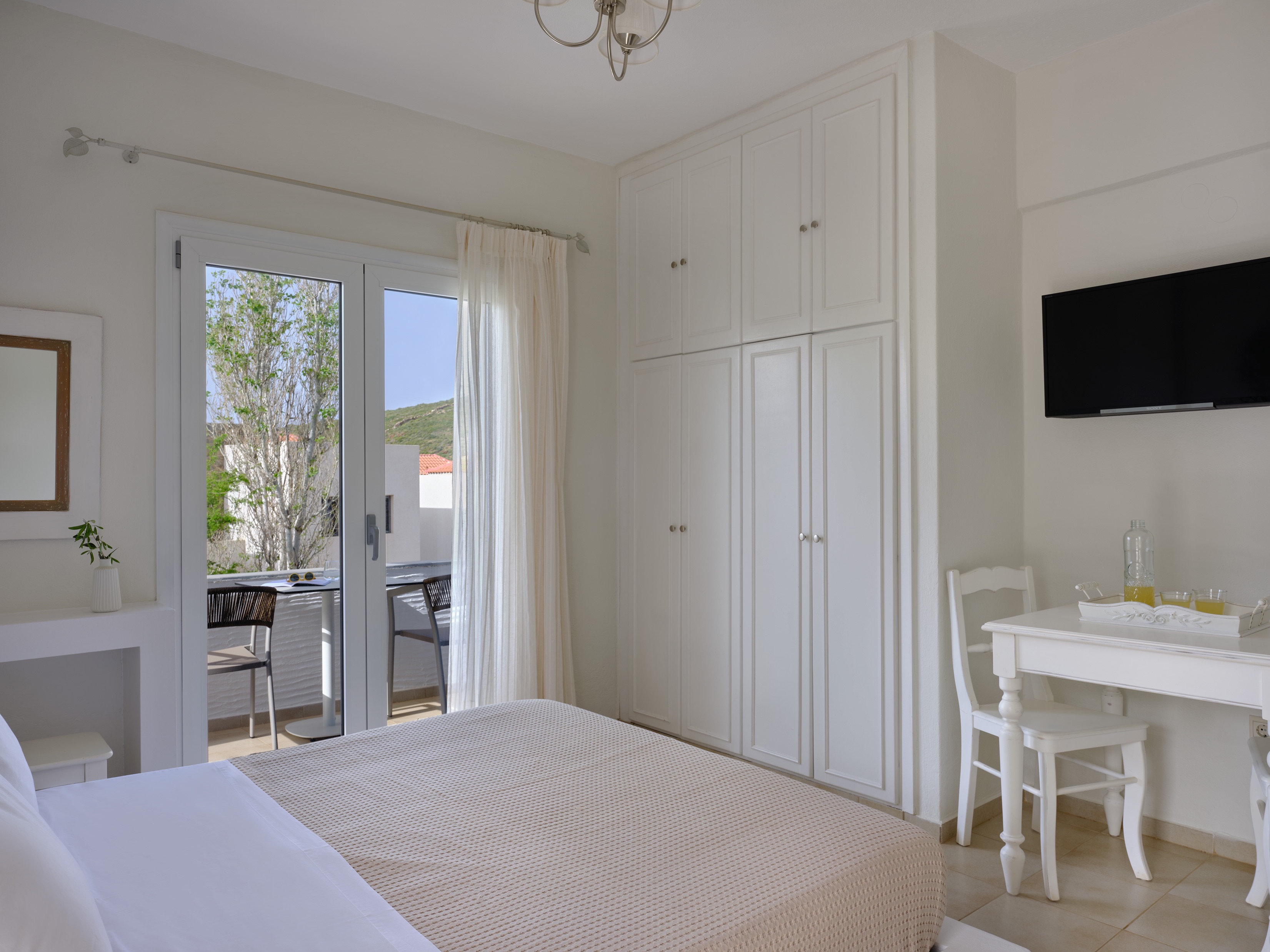 Waking up to soft morning light, whitewashed walls, and the gentle song of cicadas drifting through the open doors. This is summer in Andros. 🤍☀️ #aelia #andros