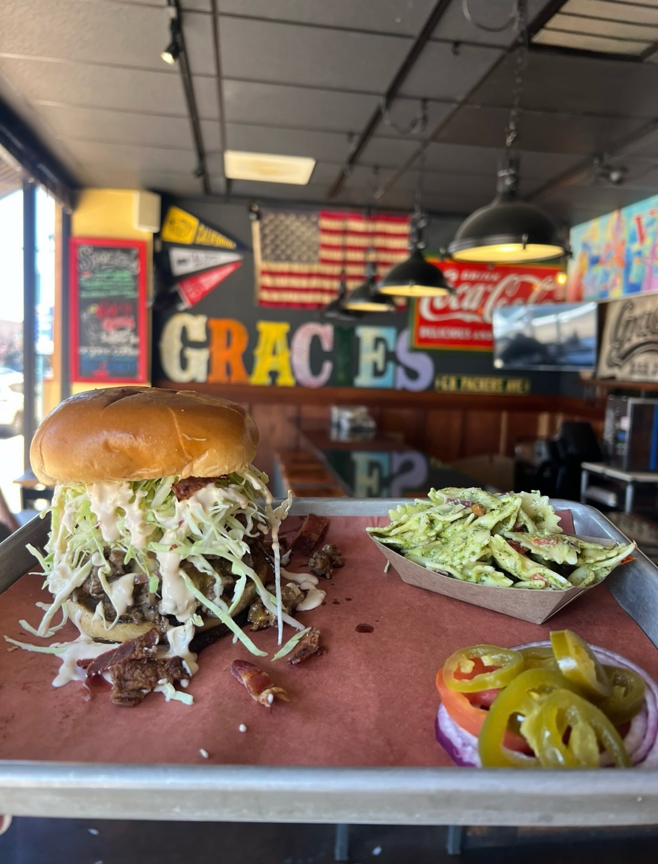 Let’s take a moment for our Smash Burger. 🍔 Fresh, in-house ground chuck, smashed on the grill, and piled high.