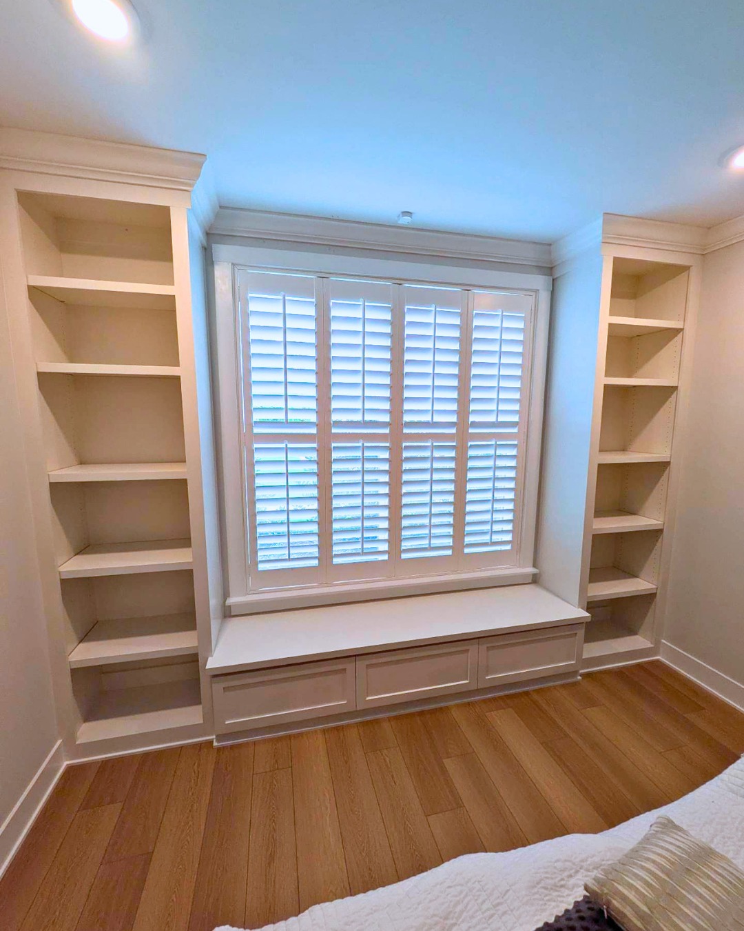 An empty wall is full of possibilities.
This bedroom had a large window, but the space around it wasn't being used to its full potential.
By adding custom built-in bookshelves and a window bench with hidden drawer storage, we transformed the entire wall into a functional focal point. Now there's a cozy place to read, display favorite books and décor, and tuck away extra blankets or seasonal items—all while making the room feel larger and more intentional.
That's one of the biggest advantages of custom cabinetry. Instead of trying to make store-bought furniture fit your room, we design every inch around your home's exact dimensions and your family's needs.
Sometimes the best seat in the house is right by the window.
✨ Swipe to see the before!
#RaleighWoodworks #WindowSeat #BuiltIns #CustomCabinetry #BedroomDesign #ReadingNook #HomeOrganization #CustomWoodworking #BeforeAndAfter #RaleighNC