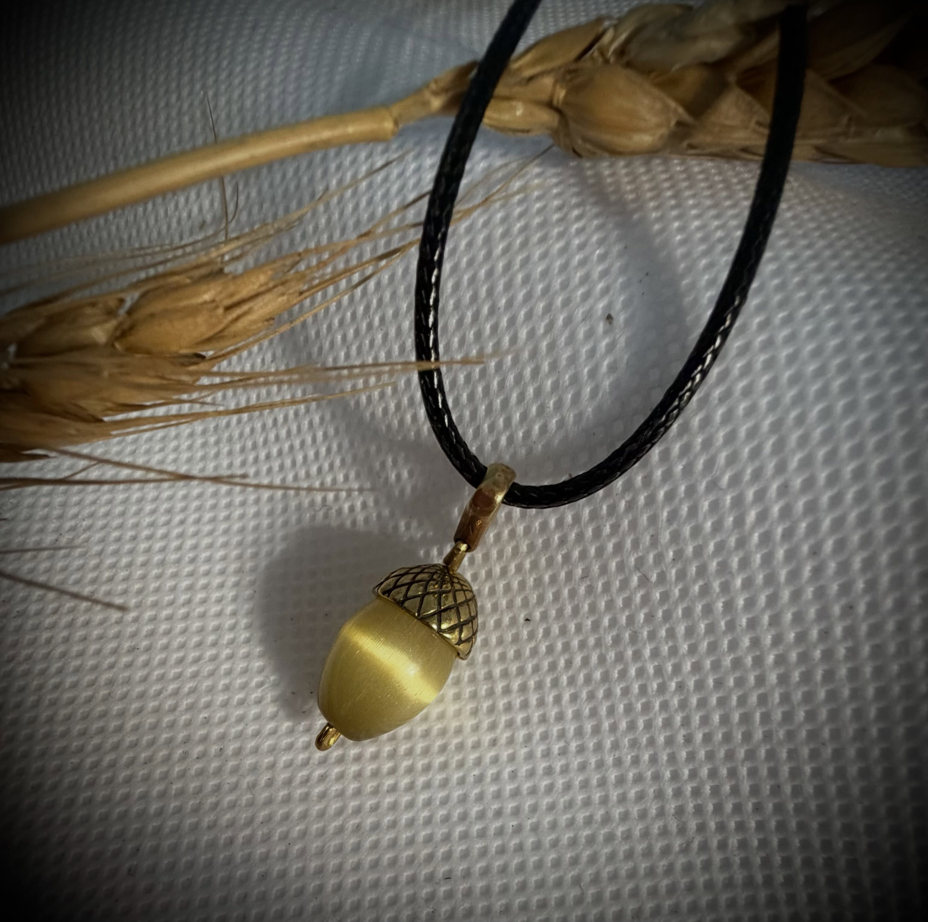 We have a beautiful range of Acorn pendants instock - bronze caps, silver caps ( small and large) and even solid silver.
Shop https://www.nordhausshop.com/new-arrivals
