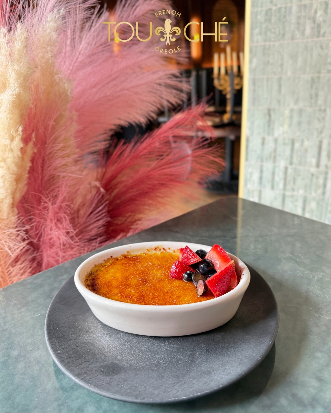 Finish your meal with the Bayou Brûlée, creme brûlée topped with fresh berries.
Reserve your table at touchefrenchcreole.com.
