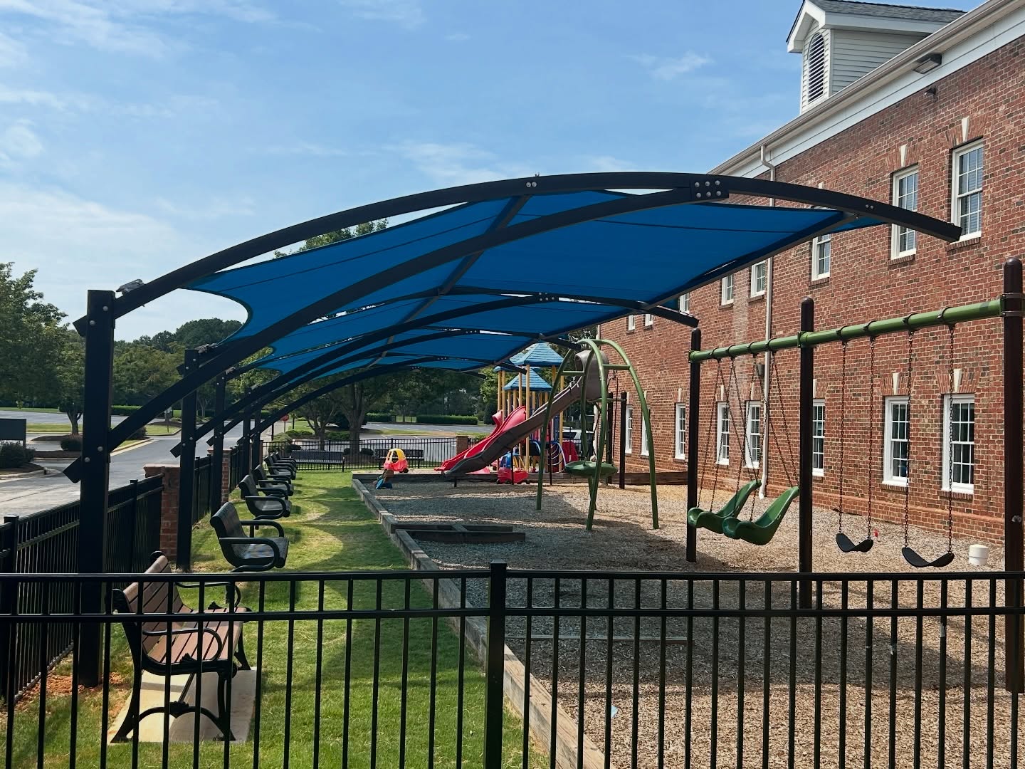 Big shade, zero obstacles with our cantilevered Chesapeake Structure☀️ This 4-bay Chesapeake at The Shepherd’s Church in Cary, NC is a perfect example of how structures can be scaled to accommodate any size.
Interested in getting shady? Click the link in the bio for more info🔗
#AtlanticCoastShade #NorthCarolina #ShadeStructures #StayShady #PlaygroundShade