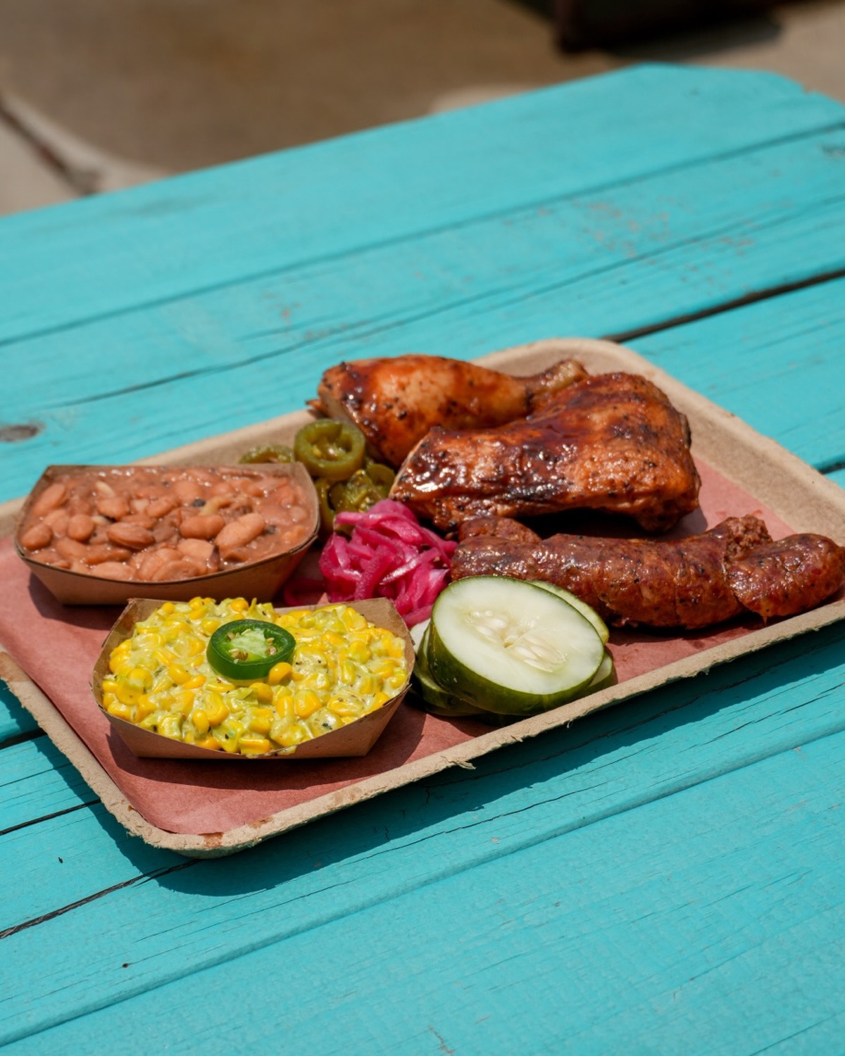 $20 can get you an entire BBQ meal! Our Texas Pit Plates come with
Option 1: Chicken & Central Texas Sausage
Option 2: Ribs & Central Texas Sausage
Plus two select sides and all the fixings! AND DON’T FORGET ABOUT THE FREE ICED TEA!!