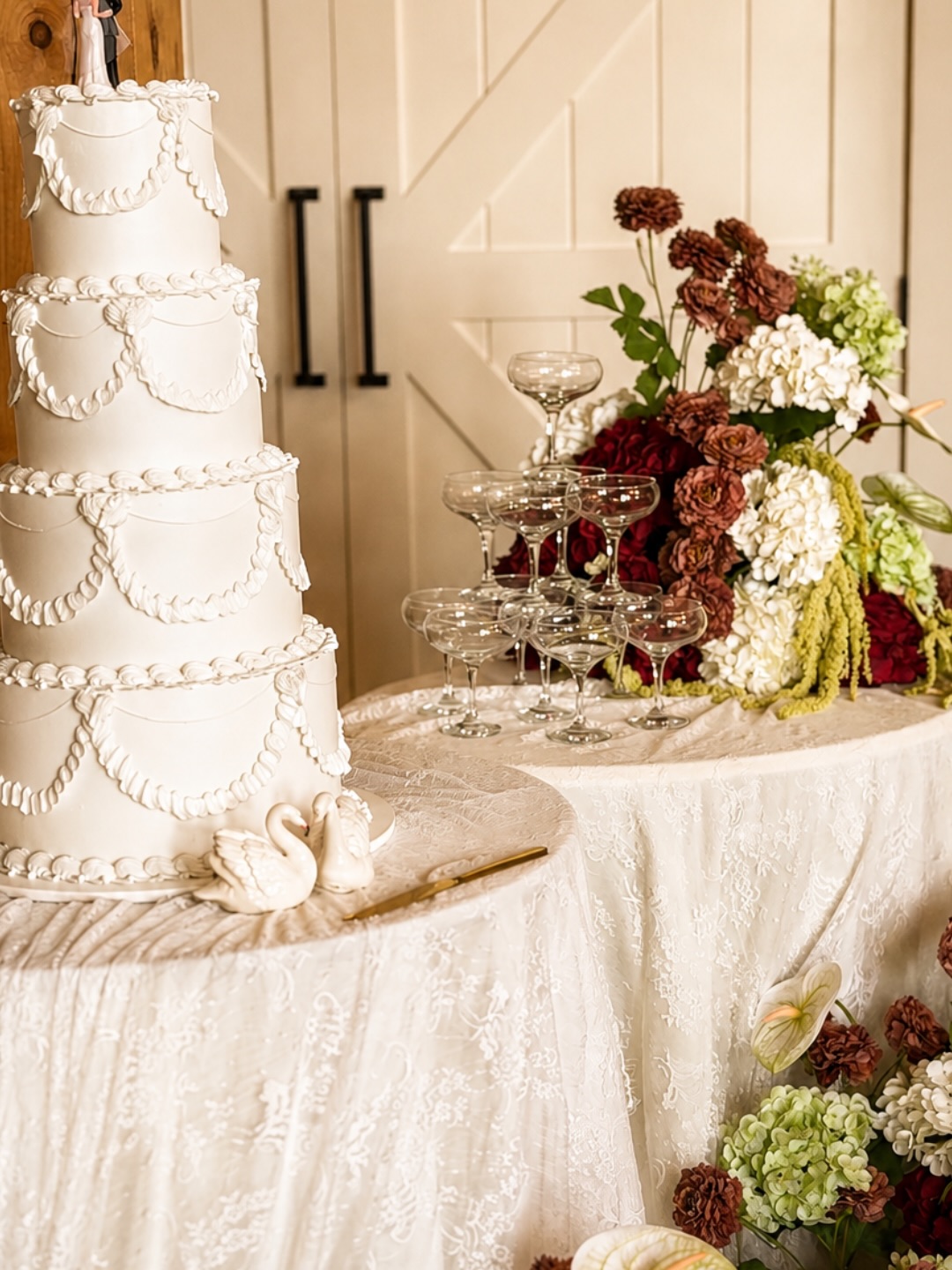 The details were never meant to compete for attention. They were meant to belong together.
Lace
Vintage frames holding quiet memories.
Champagne coupes waiting to be filled.
Soft florals spilling over tables.
Small touches placed where you only notice them when you slow down.
That is where the feeling of a wedding really lives.
Louise & William
08.13.2026