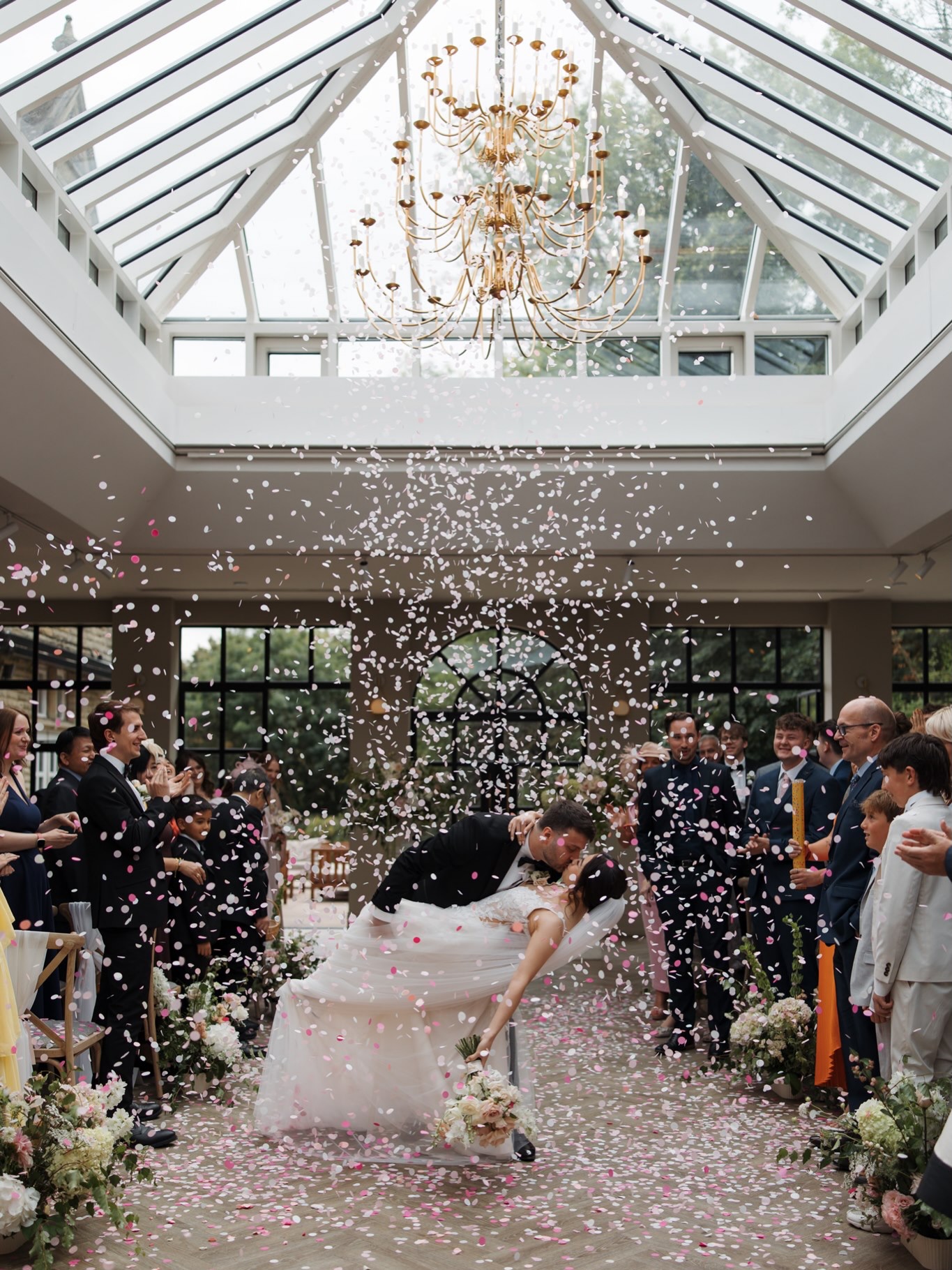 ♡ K i m b e r l e y C h u + A s h l e y D u n w e l l ♡
When beautiful details and beautiful moments fuse together beautifully ♥️
Kim and Ash had dreamed of a romantic, editorial, Bridgerton-inspired wedding, and there was certainly plenty of it. Beautiful styling, thoughtful details, an incredible dress, and the ultimate confetti dip kiss that they executed to perfection ✨
But some of the moments I’ll remember most happened when everything became a little quieter.
A Chinese tea ceremony, honouring Kim’s heritage and bringing their families together in a tradition I’d never had the privilege of photographing before.
I watched Kim relax. Dressed in red, surrounded by her family, receiving tea and red envelopes, and watching beautiful gold jewellery being placed on her. ♥️
And behind my camera, I had a little moment of my own.
There is something incredibly special about being invited into a tradition that is not yours to know, and being trusted to witness it with care.
It felt intimate.
It felt joyful.
It felt important.
And then, there was Ash.
Looking at Kim through their beautifully choreographed first dance as though there was nobody else in the room, trying his absolute best to make sure they got the moment they’d practised so carefully. ✨
A busy day with so many incredible moments, but somewhere in between it all, Kim came and sat beside me to breathe. And honestly? I was rather honoured to be her quiet corner for a little while.
Kim and Ash, thank you for trusting me with all of your story. The beautiful, the joyful, the carefully considered, the deeply meaningful. And for letting me witness a little piece of your family story that I’ll carry with me for a long time. ❤️
Esther ♡
Wedding Photographer | Midlands Wedding Photographer | Romantic Wedding Photographer | Authentic Wedding Photographer | Timeless Wedding Photographer
@hotelwoodlands
@houseofbloomfloral
@theflamingobakery
@extrafleureventstyling
@gemmabaxmua
@amyelliotthair
@azazie
@waterfall_weddings
@contentbylaurenc
.
.
.
#ukweddingphotographer
#naturalweddingphotography
#timelessweddingphotography #editorialweddingphotographer #relaxedweddingphotography