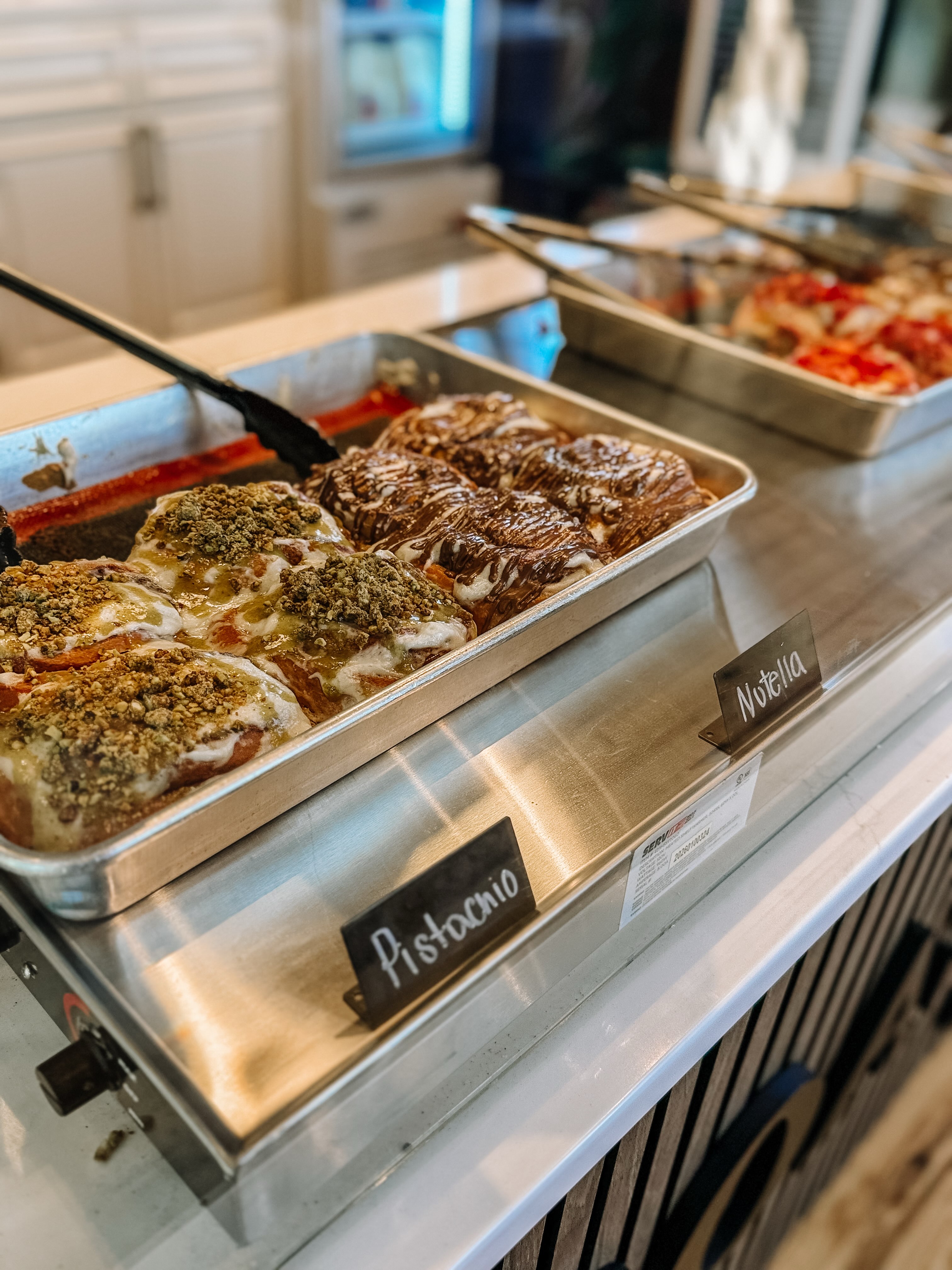 Mornings at The Station are a whole vibe ☀️
Fresh coffee, cinnamon rolls, refreshers and empanadas all before noon!
Stop by today and pick your favorites.