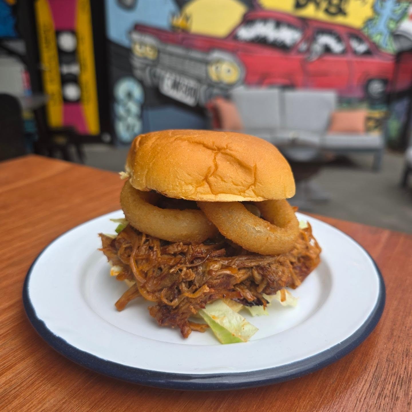 Thinking of what to have for lunch today?
Come down and try our pulled pork burger special. Loaded with juicy pulled pork and topped off with crunchy onion rings.