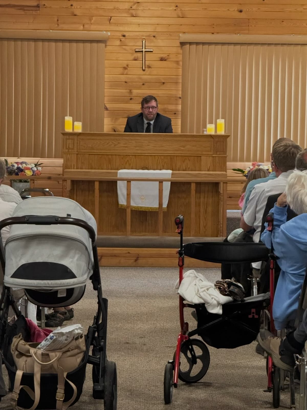 For the closing service of 2026 Hasscib Lake Regional Services, Arvin Pirness of Buffalo, Minnesota chose verses from the 139th Psalm.
Pirness reminded the listeners that God knows us. He knows our thoughts and ponderings and the path before us. He cares for us and wishes to protect us.
When we try to imagine the omnipotence of our Creator we fall short, but a child of God can trust and only has to believe.
We can’t escape God either. If we go to the deepest part of the sea or to the greatest height, God knows where we are. We can take comfort in this. When we have matters on our conscience we might want to hide, even if we can remove all evidence of our misdeed, God still knows. We don’t need to hide. We can have these transgressions forgiven in the blood of Jesus. Regardless of where we are, the Gospel is only an ask away.
If you are struggling, God sees that too. God’s hand is there to lead and guide you to the grace alter. There are services guests here from many zip codes and we all can preach the Gospel.
Then psalmists ends with these thoughts in verse 23, “Search me, O God, and know my heart: try me, and know my thoughts.” He is asking for God to protect from matters that might lead him astray. Remember we don’t need to make this journey alone.
When we leave this service weekend, may you go home with the good greetings. We pray the work of the enemy won’t consume this gift of faith.
“To our blest creator thankful praises flow…” (SHZ 353)
Text, video and photo: Ruth DeLacey