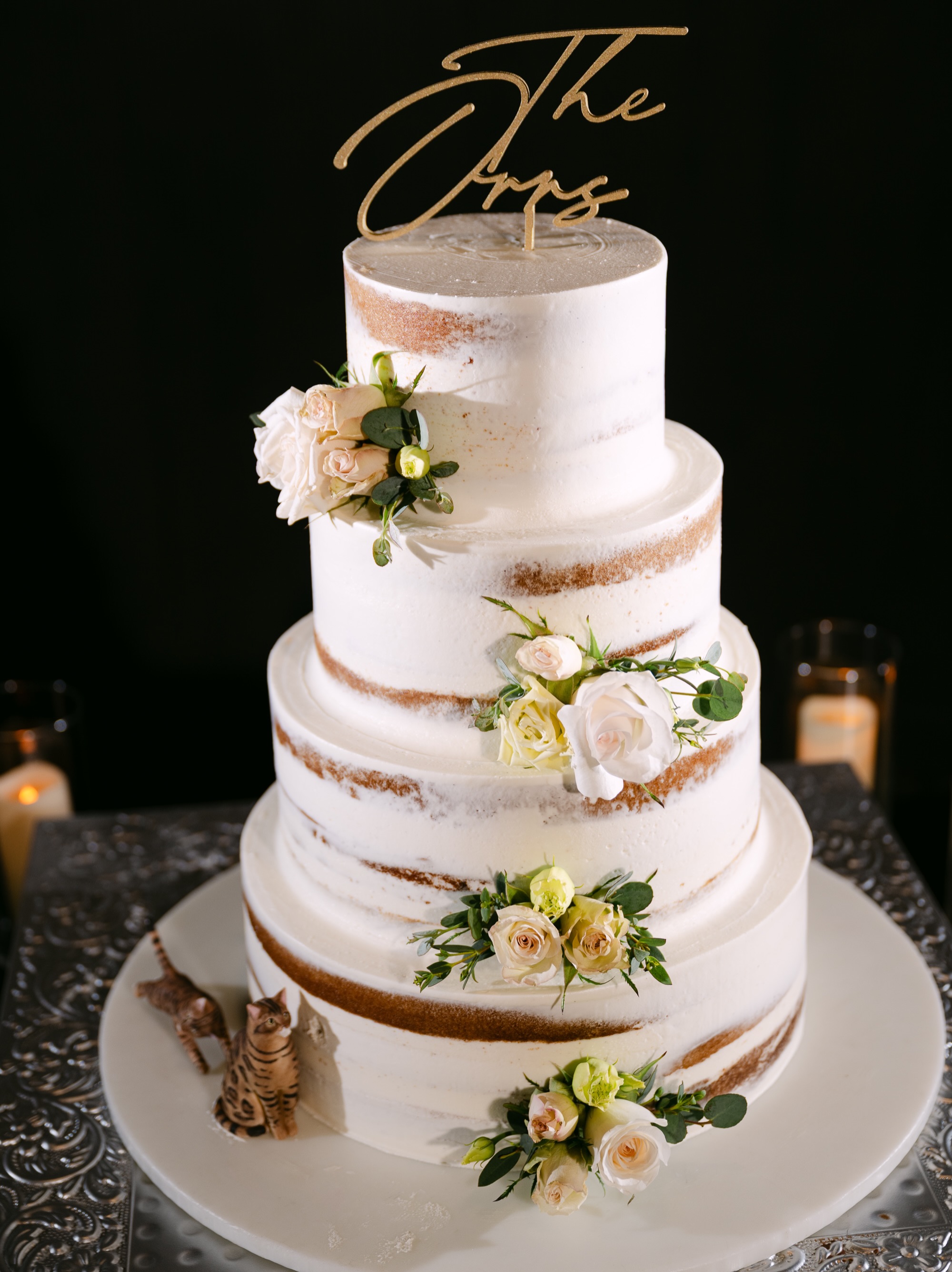 Our pastry team brought the cake to life, finished with beautiful floral touches from Willow & Thistle for the perfect wedding day detail!