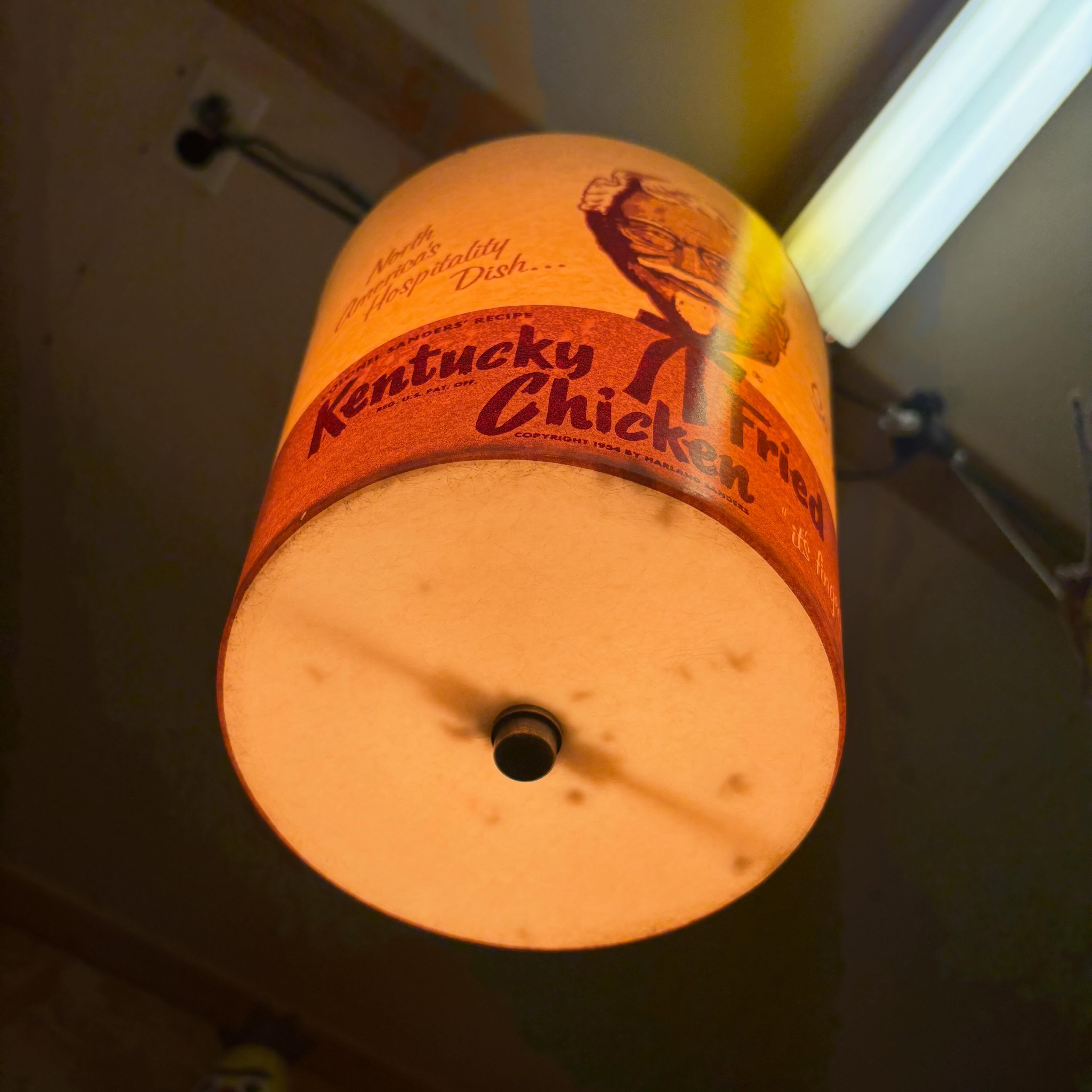 You might catch more flies with honey than vinegar- but have you tried using a KFC bucket lamp?
