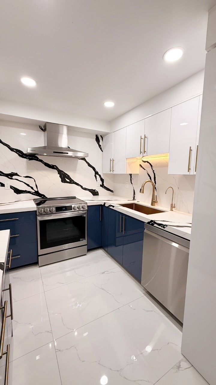 ✨ Kitchen Transformation Complete! ✨
Modern navy & white cabinetry, bold black veining, and elegant gold finishes. 💙🤍✨
Ready for your dream kitchen? Contact us for a Free estimate!
#kitchen #kitchenremodel #modern #homeimprovements #dreamkitchen