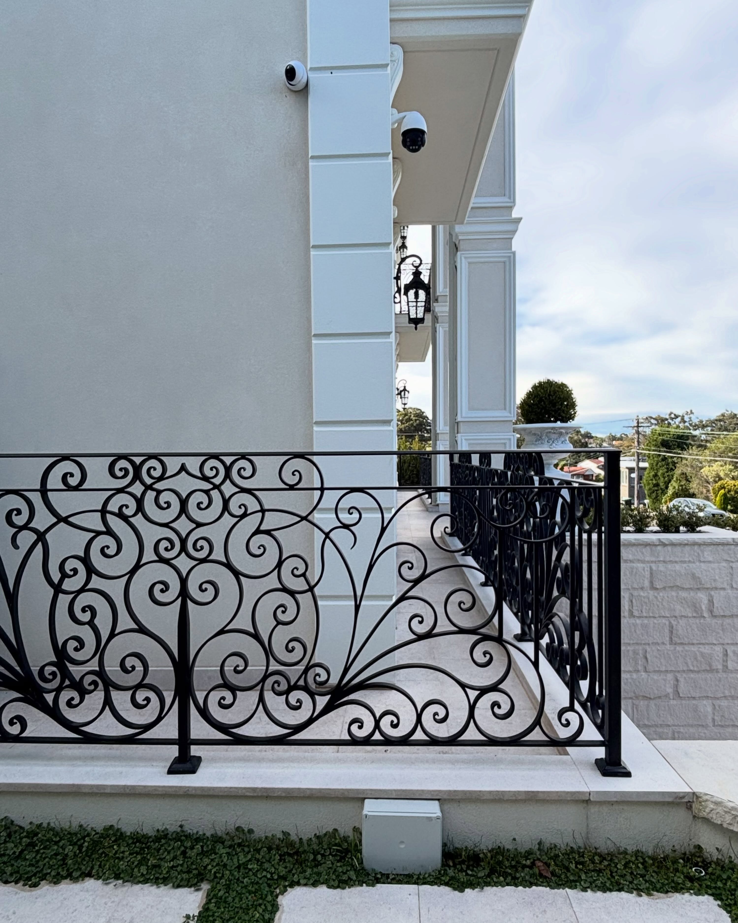 Exterior Balustrades with matching Custom Wrought Iron Door.
Custom Handcrafted. Hot-dip Galvanised. Matt Black Finish.
Post 1/3