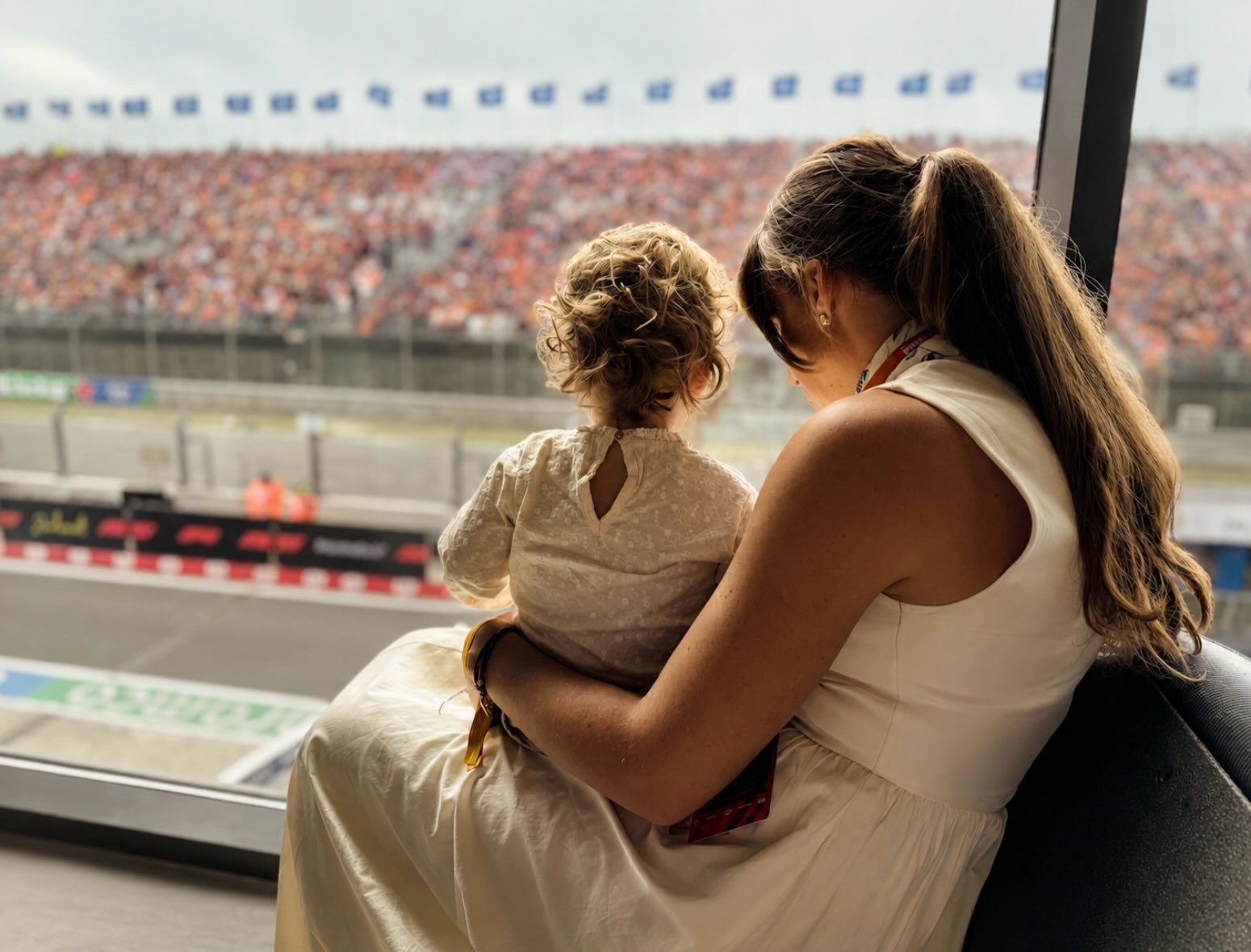 Ready for the final dance.
One last time, that feeling of excitement running from the tips of your toes to the heart.
The sea breeze, the cries of the seagulls, the bass carrying the first Max Verstappen songs through the air. Cycling alongside the crowds, through the crowds, and around the crowds.
Six years that were never written into the future, yet somehow, you and your team wrote them anyway. And you exceeded every expectation along the way.
Our little pearl, born two years ago in the week of the Dutch Grand Prix, making sure this week of the year would forever hold an even deeper meaning for us.
Pride, excitement and love take over now, with only the occasional moment of melancholy.
The last time, for now.
And because we love to dance, only the future will tell us where, and when, the music will start again.
🧡