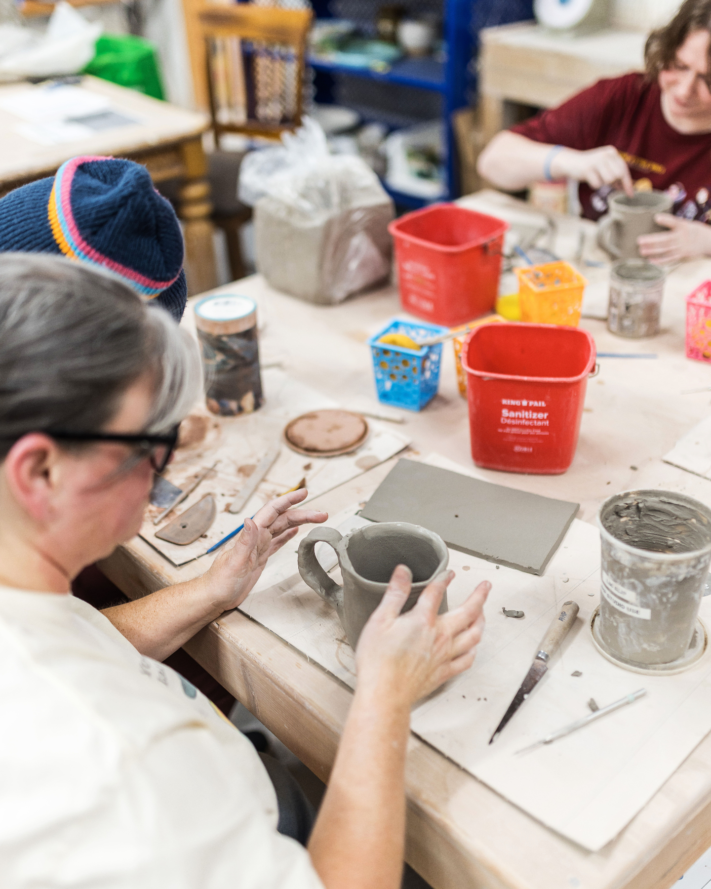 Some days at the studio look a lot like this: clay on the table, tools everywhere, a project taking shape, and someone across from you working on an entirely different idea.
No two pieces are headed in quite the same direction, and thatās half the fun.
What would you be making if you had a seat at this table today?