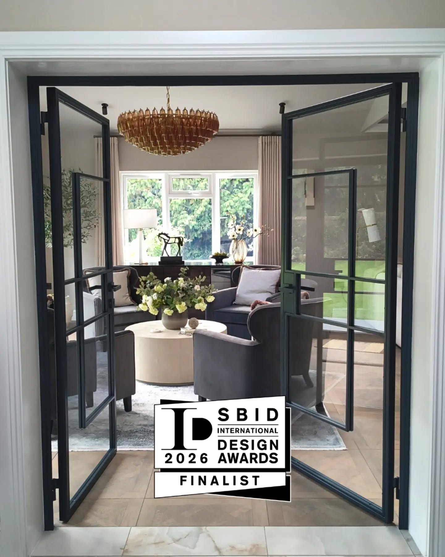 Last day to vote ✨
Public voting for the SBID International Design Awards 2026 closes on Friday 4 September, at 5pm. My Elegant Living Room, Reigate is a Finalist in the Residential Budget Up To £50,000 category, and the public vote makes up part of the final result.
This project was a genuine highlight for me. A large room the family had stopped using, redesigned into the space they now live in every day and love. It holds real warmth and a sense of occasion, from the pair of amber glass chandeliers to the soft layered lighting in the evening. The new steel and glass doors frame it beautifully and create a striking view from the kitchen.
If this room speaks to you, I would love your vote before it closes. It only takes a moment. Vote via the link in my bio.
Thank you to everyone who has voted and shared over the last few weeks. It means a great deal.
.
.
.
SBID 2026 Finalist. Interior design in Reigate and Surrey.
#SBIDAwards #InteriorDesignSurrey #ReigateInteriors #LivingRoomDesign #InteriorDesigner