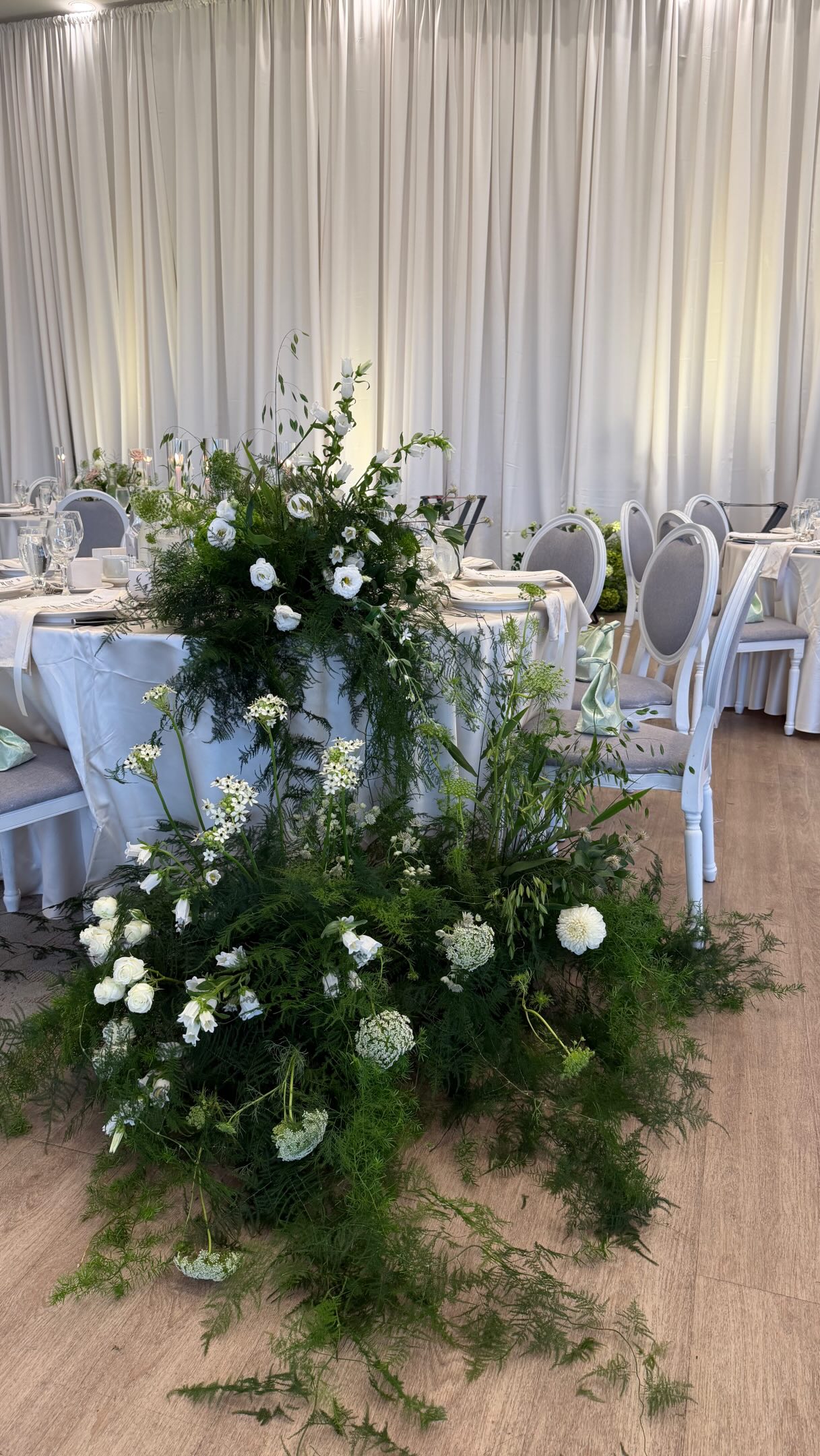 Romantic draping, lush garden florals, and a view that deserved to stay part of the design. 🤍🌿
For this wedding, we framed the floor-to-ceiling windows with soft layered fabric and organic floral installations, allowing the natural landscape to become part of the backdrop. Warm blush, ivory and muted greenery brought just enough colour while keeping the overall look airy, elegant and timeless.
One of our favourite details is how the florals feel as though they’re growing naturally into the space — lush, dimensional, but never taking away from that beautiful view.
Soft. Romantic. Garden-inspired. ✨
Planning: @w.events_toronto
Floral and decor: @peachwoodevents
Photographer: @stevenshiphotography
Venue: @eventsdeercreek
#deercreekwedding #torontoweddingdecor #torontoweddingflorist #weddingdecortoronto