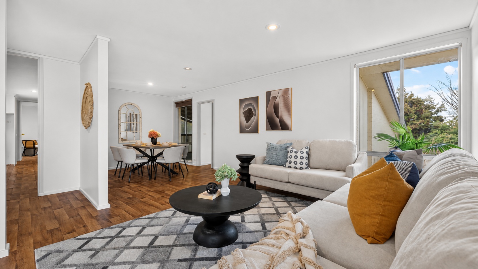 A warm, contemporary palette connects both living and dining spaces, combining soft neutral upholstery, rich timber flooring, sculptural black accents and layered textures. 🤎
#canberra #canberrahomes #canberrapropertystyling #canberrastaging #propertystyling #interiorstyling #homestaging #realestatecanberra #luxuryinteriors #styleupstaging #styleup