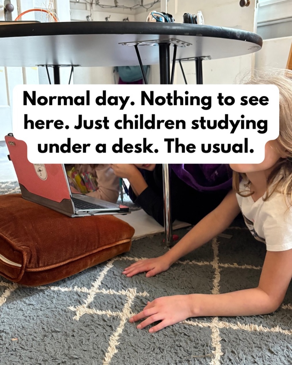 We let our students choose how they work. On the floor, at a standing desk, tucked into a cozy corner, or sometimes even under a desk. And honestly, we stopped questioning it a long time ago (even though it makes no sense to us!) because the results speak for themselves. That freedom breeds focus.
When you give a child the freedom to figure out what works for their brain and their body, something really amazing happens. They actually focus! And that’s because they found a way that genuinely works for them.
That kind of trust helps build a positive relationship with a student. It tells them that their instincts matter, that they know themselves, and that learning is something they get to own. And that adults don’t always know best!
And when a child feels trusted, they show up with more enthusiasm and sincerety. They are more engaged, more motivated, and more connected to what they are learning.
Freedom, within reason, is not chaos. It is respect. And children rise to it every single time.