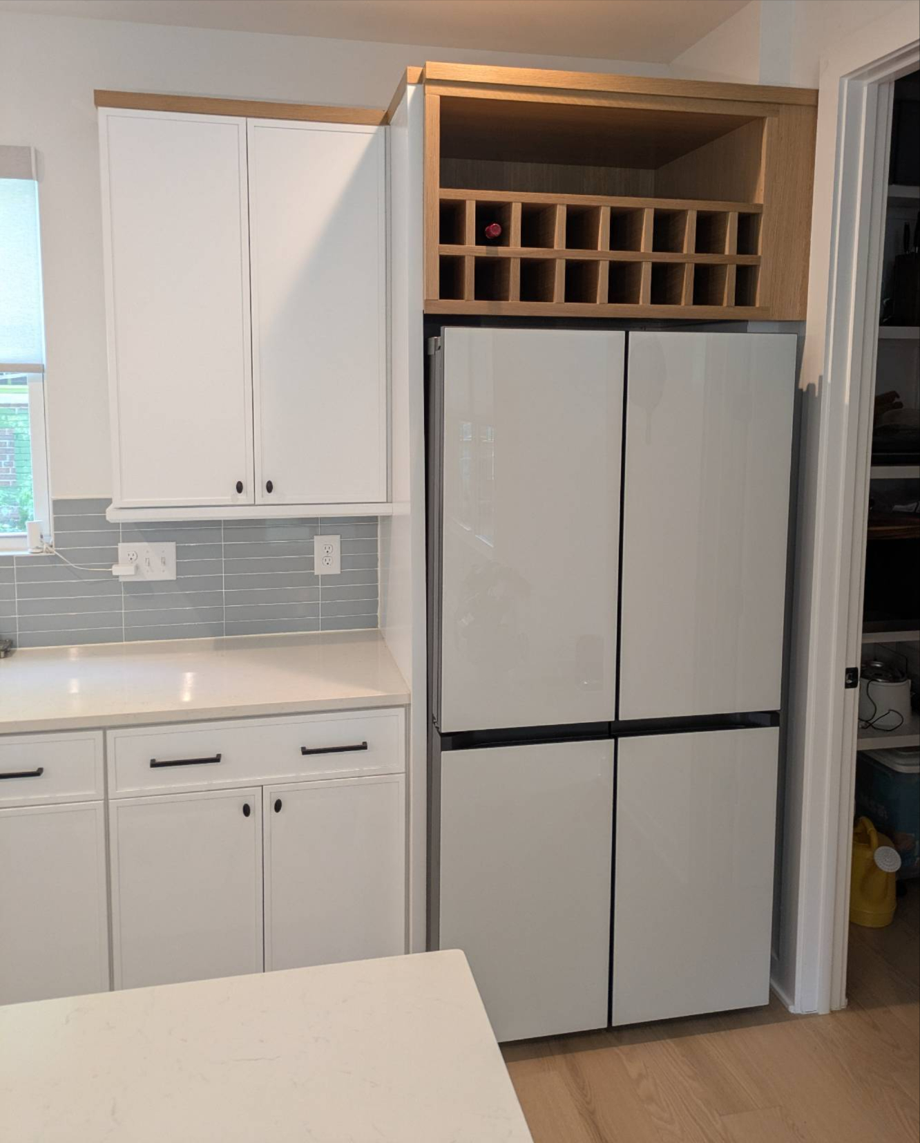 The details may seem simple—but they're often what make a space feel truly finished.
For this kitchen, our team crafted a custom white oak wine rack above the refrigerator and added matching white oak trim above the cabinetry. These small additions brought warmth, balance, and a custom, furniture-quality feel to the entire space.
Projects like this are a great reminder that custom cabinetry isn't always about doing more—it's about doing the right details well.
Sometimes, it's the finishing touches that make all the difference.
#CustomCabinetry #WhiteOak #KitchenDesign #BuiltIns #CustomWoodworking #InteriorDesign #Craftsmanship #MadeToFit