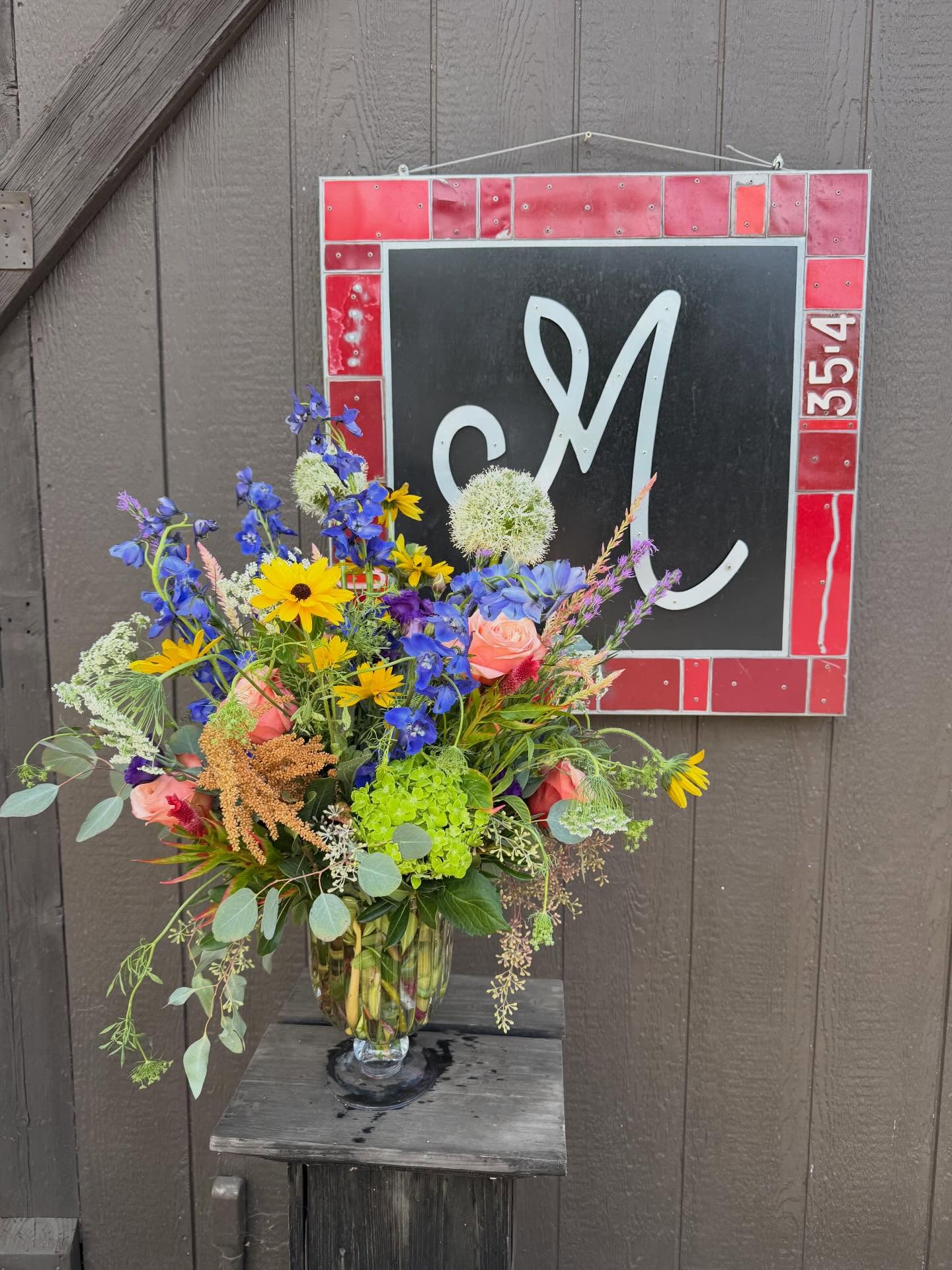 “Wildflowers don’t care where they grow” - Dolly. A beautiful wildflower styled arrangement to celebrate a special teacher/proncipal.