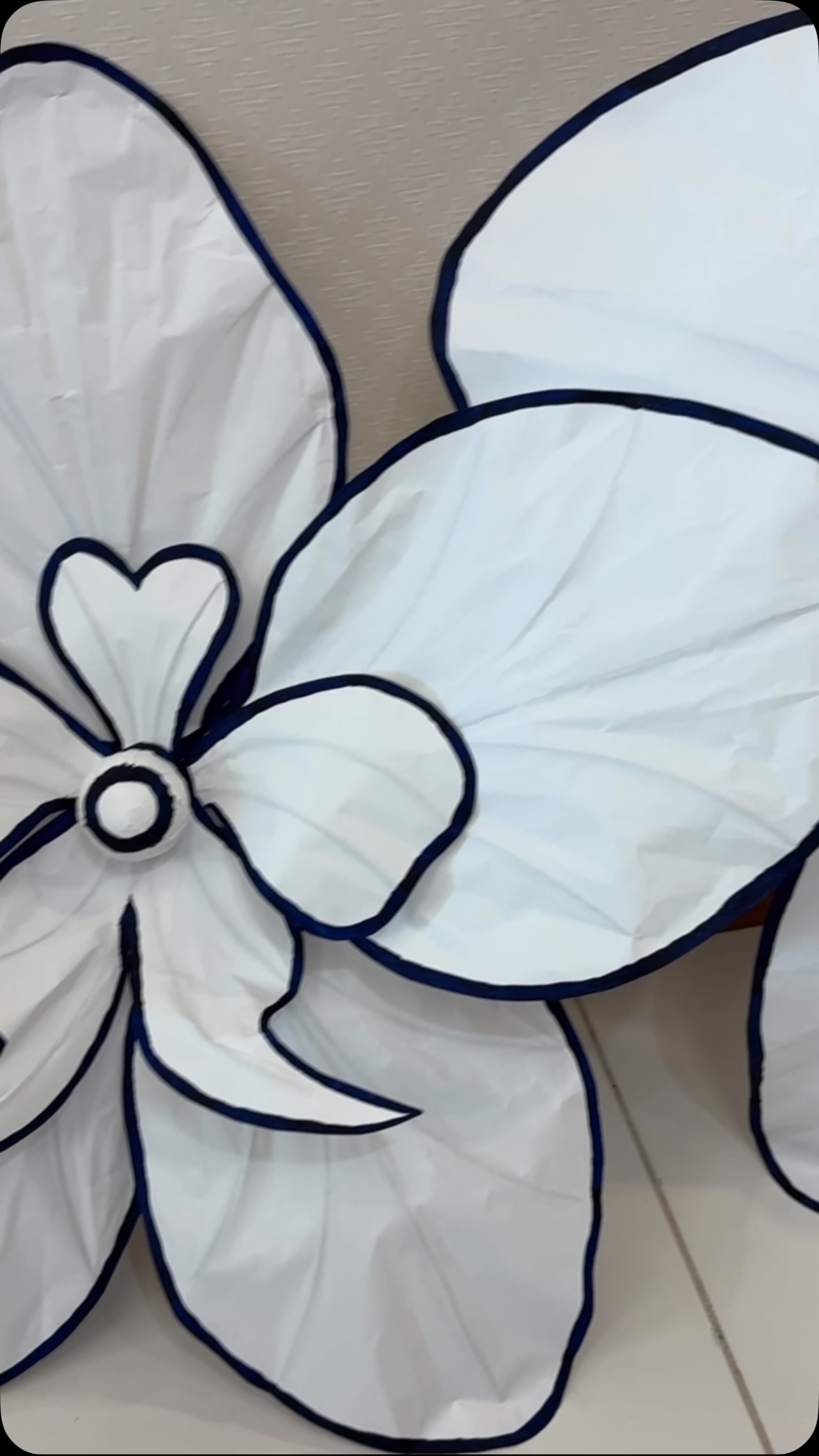 Giant stylized paper orchids. #thepaperbloomsg #eventstyling #storedecor #handmadegiantorchids #paperartwork
