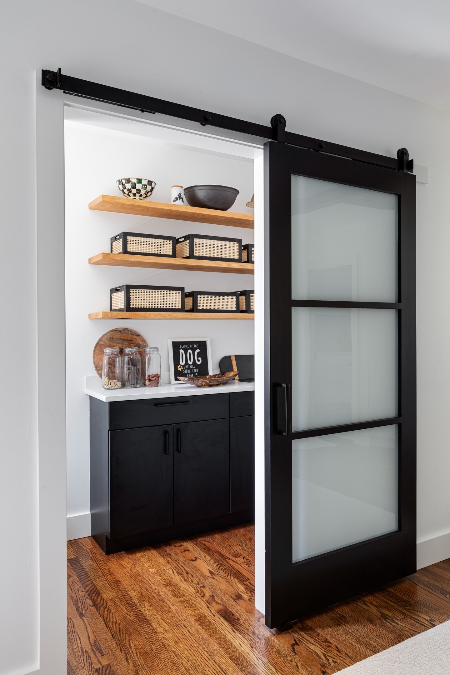 The most memorable spaces are not always the largest.
Across three different Cape Cod homes, thoughtful carpentry and custom millwork transform compact areas into places designed for real life: a cedar sauna for unwinding, a beverage bar for everyday convenience, and a dedicated dog pantry that gives pet essentials a polished home of their own.
When every inch is considered, even the smallest room can add comfort, function, and personality.