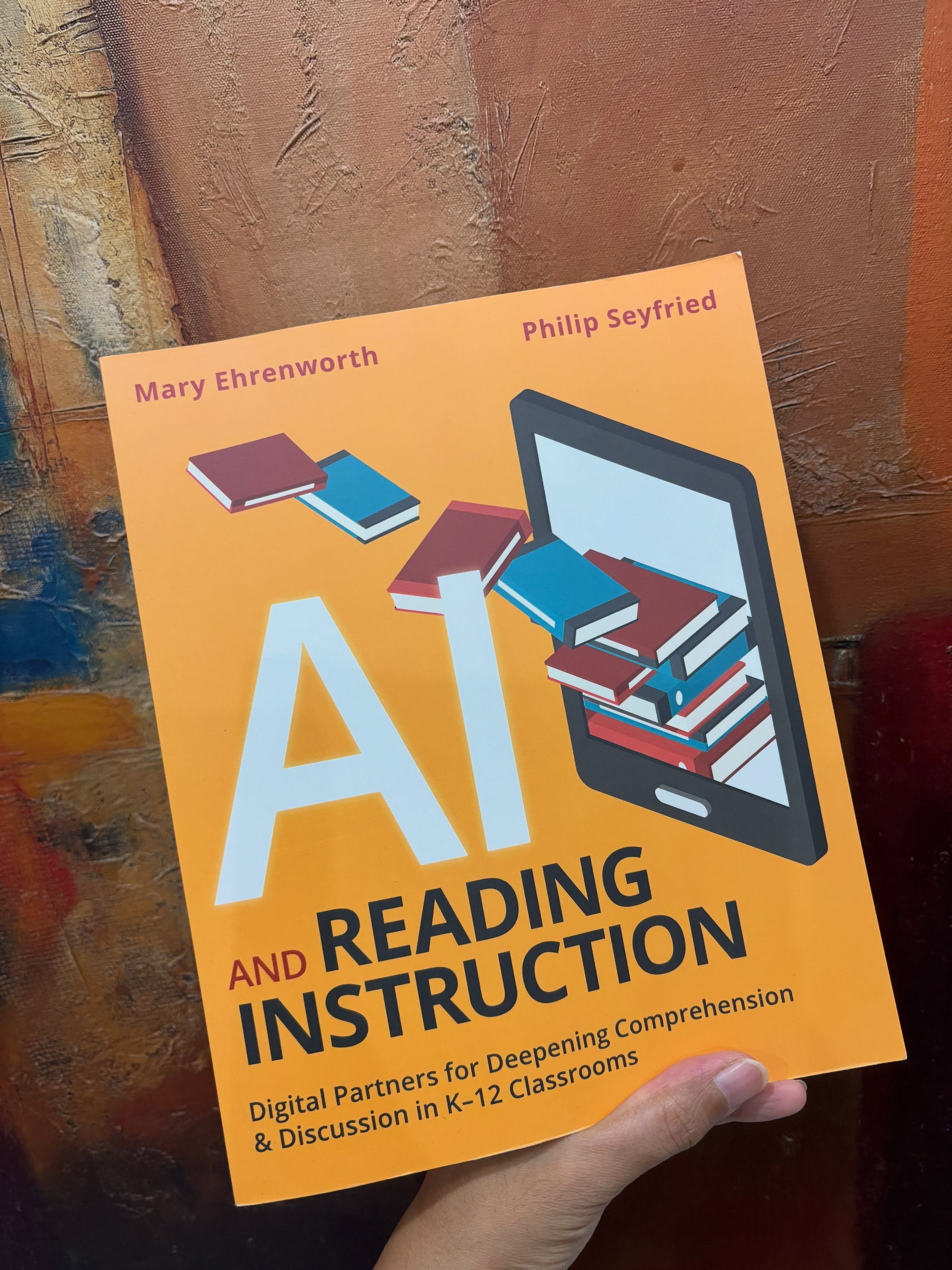 These days, almost every educator claims to be an AI-in-education-expert. But look deeper, and their expertise seems to be limited to using popular tools to make instruction easier.
That is not what gets me excited. I’ve been on the lookout for the work by ‘experts-in-education’ who embrace AI with discernment. They do not simply ask, “What can AI do for me?” but “What can AI make possible for learners?” without compromising the thinking and creativity at the heart of literacy instruction.
And this is exactly why I am buzzing to read the new book by Mary Ehrenworth and Philip Seyfried, because when it comes to AI and literacy, I’d rather listen to literacy experts than just anyone with an AI subscription!