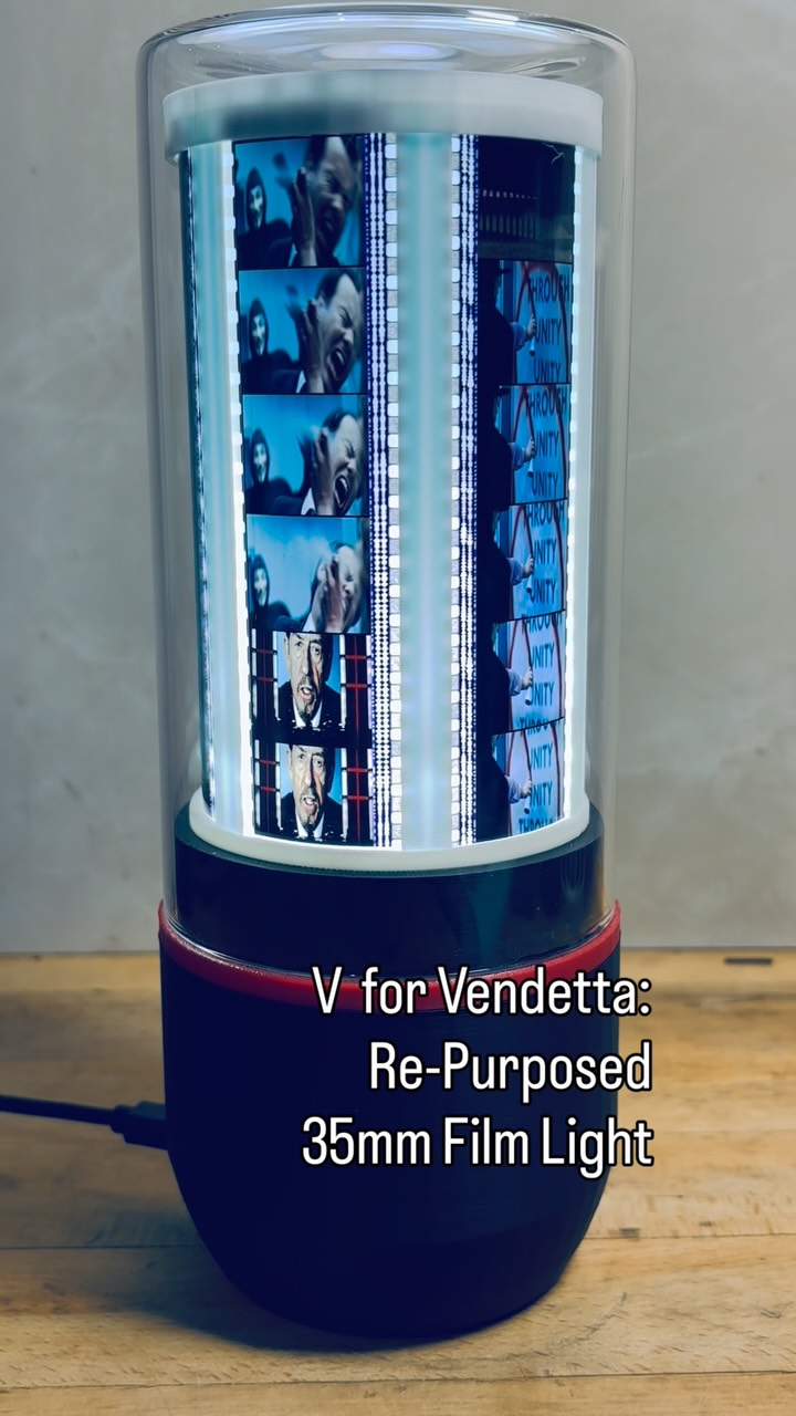 We created this unique light by re-purposing actual 35mm film from the movie ‘V for Vendetta’, released in 2005.
This custom light contains 42 actual film cells from the film and features a unique assembly (‘A World’s First’) to encapsulate this beautiful film. A small motor is inserted into the base allowing slow rotation & an internal led arrangement backlights the film. A protective glass dome is placed over the complete assembly.
We are a small family-owned business with a mission to create unique designs with the highest quality materials. All of our products are made in our studio in Ont., Canada and shipped worldwide. #vforvendetta #graphicnovel