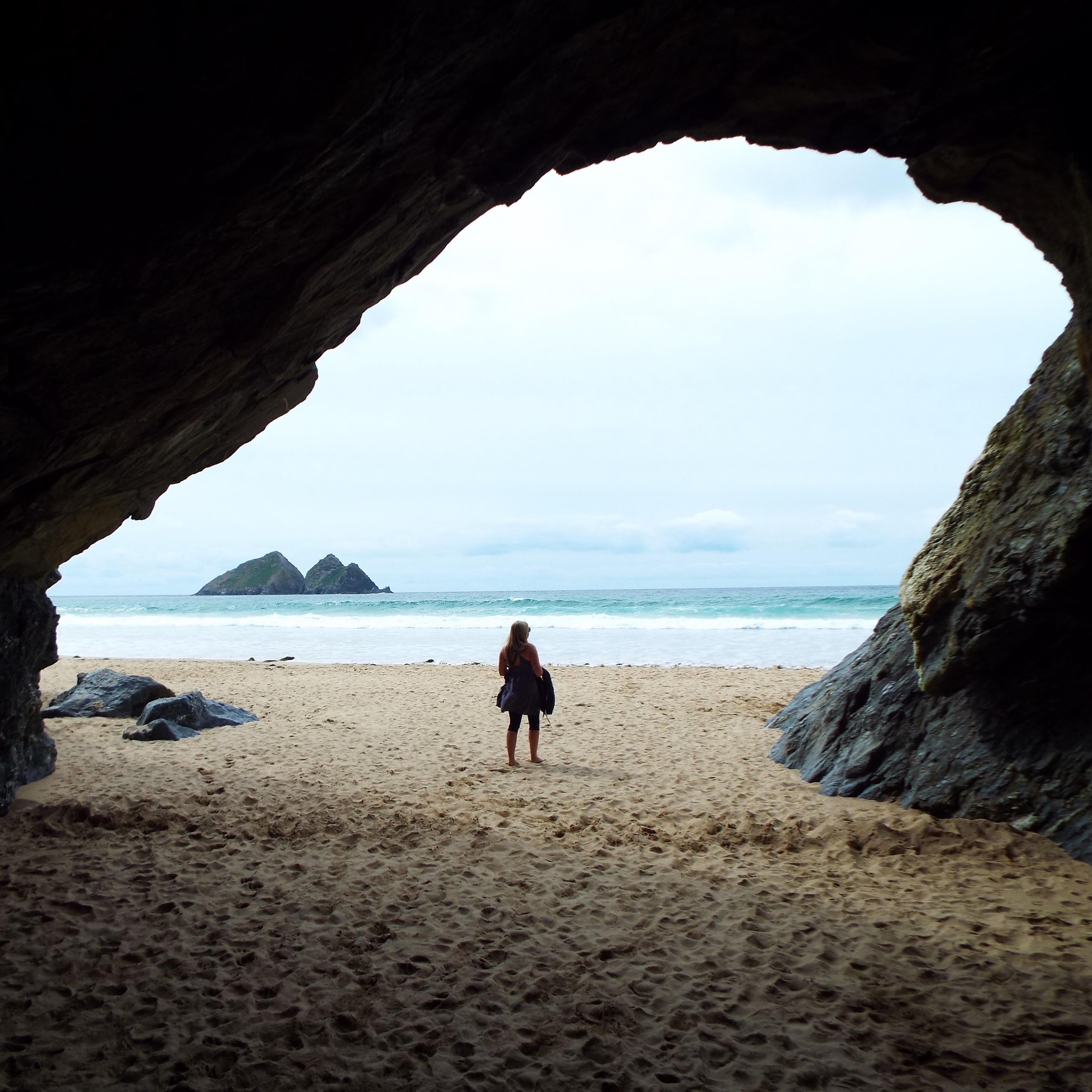 On Sunday those visiting Holywell in north Cornwall were met with a mighty surprise!
A huge rockfall occurred overnight, completely obscuring the entrance to the famous holy well - a natural spring in a cave - and may have caused the cave to collapse as well.
Whilst Cornwall’s coast is largely made of hard bedrock, it is still susceptible to coastal erosion.
This is controlled by two main factors - fractures in the rock, and groundwater.
Fractures are planes of weakness that allow rock to fall apart. The frequency, consistency, and orientation of fracture networks all contribute to the susceptibility of a rock mass to fall down.
Water has a profound effect on rock mass stability. Water can percolate through fractures, or through the rock itself if it is porous.
Water under pressure pushes back equally in all directions. So the weight of rock pushing down, which usually keeps the rock mass stable, is equally pushed back by the force of water.
This decreases normal stress (direction of force acting perpendicular to a surface) and increases shear stress (direction of force acting parallel to a surface), thus increases the chance of slip occurring. It effectively acts as a lubricant.
At Holywell, low-angle Variscan thrust faults and later high-angle extensional faults have created a series of perpendicular fracture patterns.
Add to this the weather we’ve had this summer - very hot and dry, but more recently very heavy rainfall.
Dry weather causes the rock to contract, increasing the frequency of cracks. Also, dry ground above causes water to fill cracks faster than the ground can absorb it. Add to this the weight of the ground above, the chance of failure rapidly increases.
It has created a perfect scenario to increase the likelihood of cliff collapse. Something that is unlikely to be an isolated occurrence in Cornwall over the next few days and weeks.
Read my full article on this at https://www.cornwallgeologist.co.uk/news/erosion-of-a-hard-rock-coastline-—holywell-bay-cliff-collapse
#rockfall #holywell #cornwall #geology #geologist