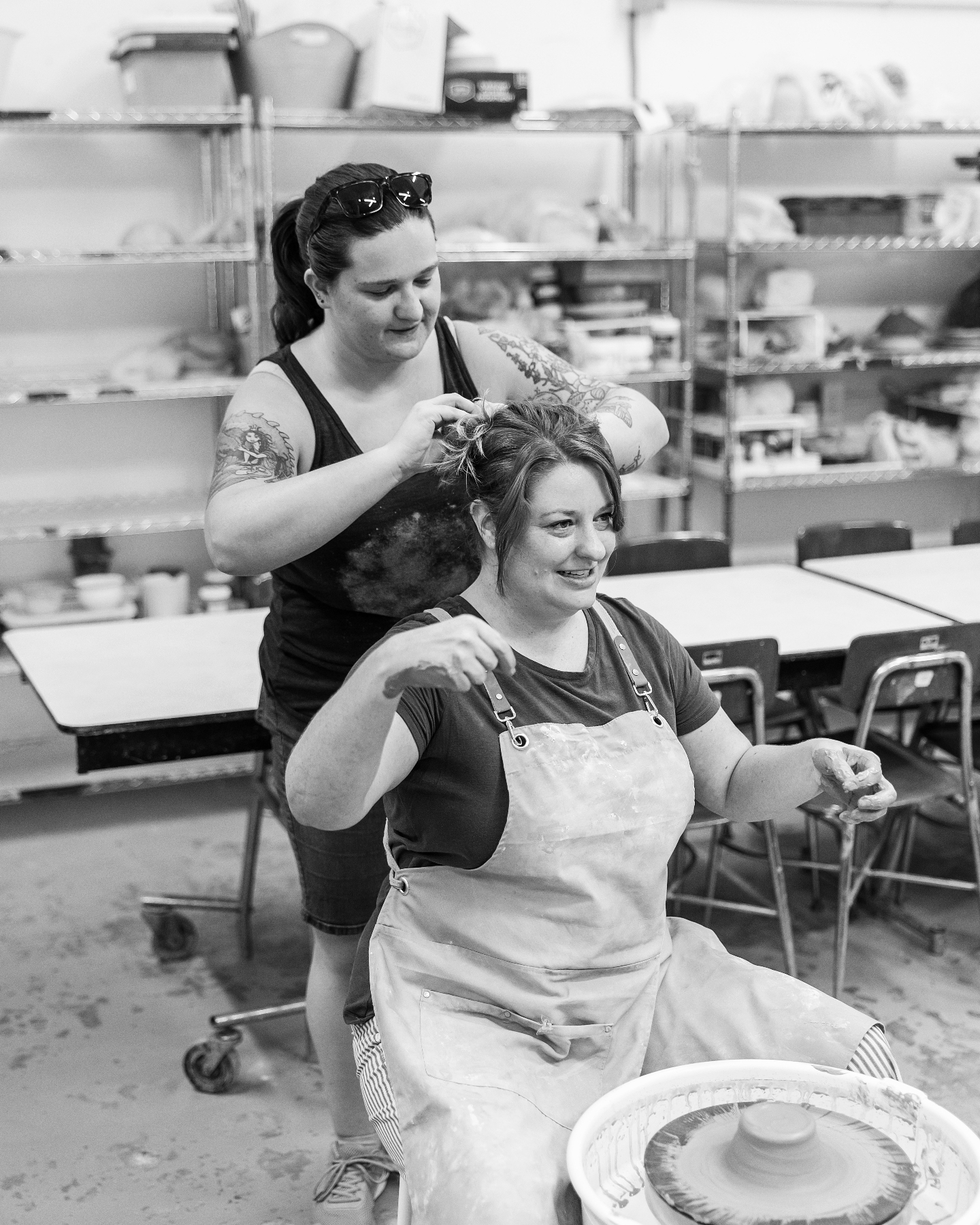 Consider this your friendly pottery PSA: if you have long hair, pull it up before you sit down at the wheel. š
Because as fun as it is to get your hands in the clay, weād prefer your hair not join in as the wheel starts spinning.
Hair ties: a highly underrated pottery tool. š