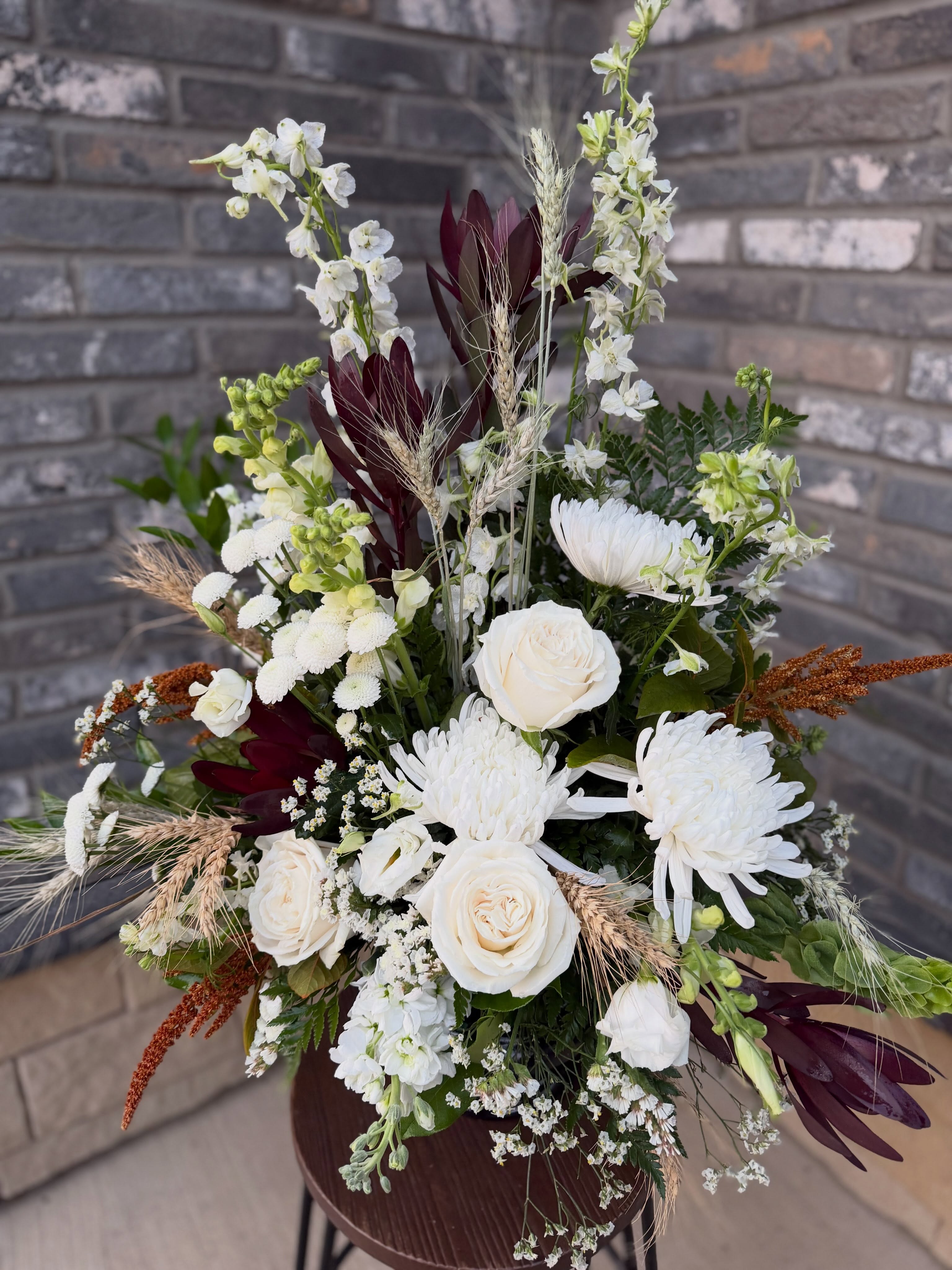 A beautiful white tribute, thoughtfully created for a beloved baker. 🤍
What made this arrangement especially meaningful was incorporating pieces that told his story — his dough roller, flour scoop, and baker’s hat, all nestled among the flowers.
It’s such an honour when a family entrusts Dutchess with something so personal and special. Flowers can be more than beautiful; they can hold memories, celebrate a life, and tell a story. 🤍
Thank you to this family for allowing us to be part of such a meaningful tribute.