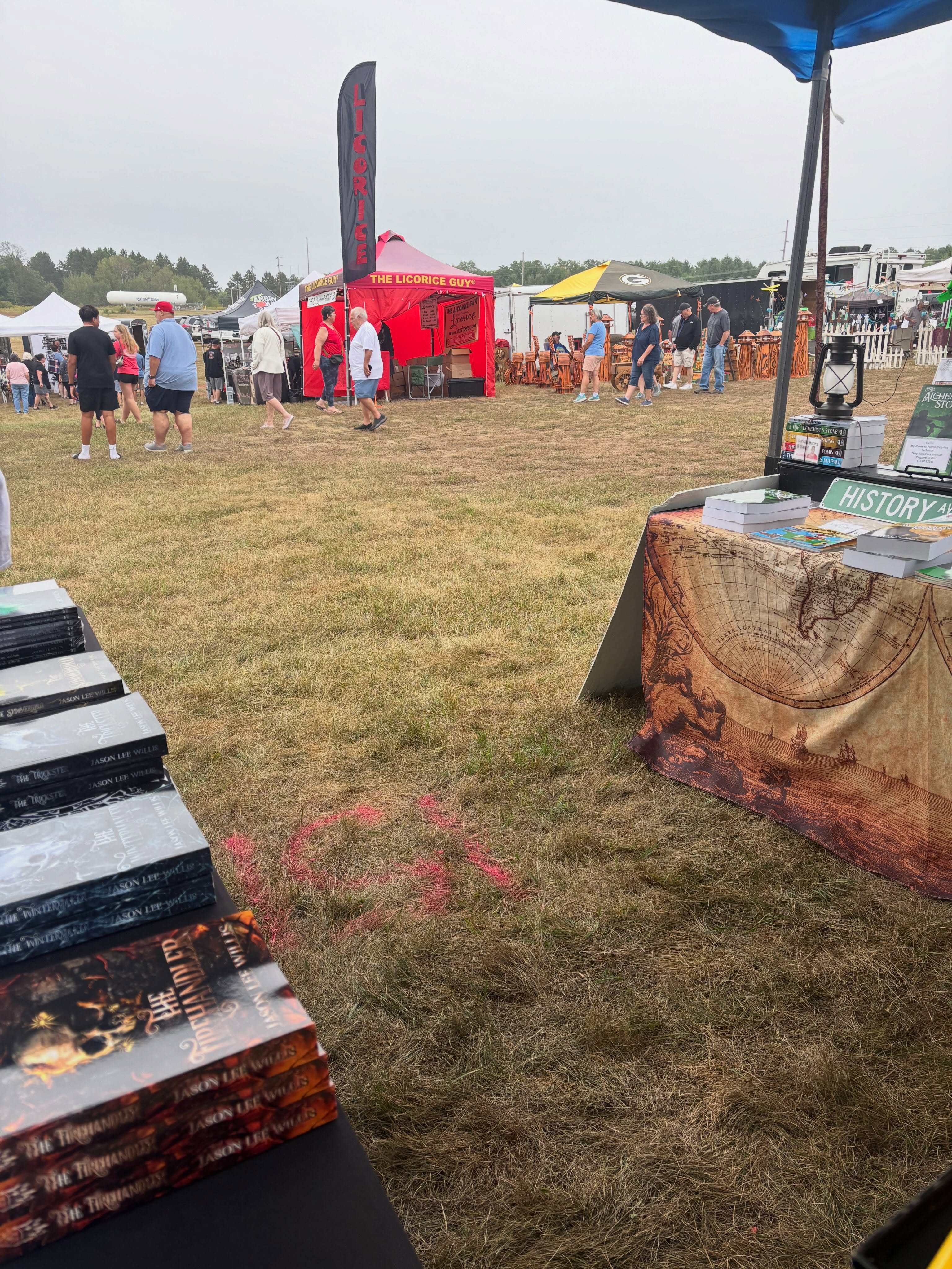 First sale of the day: the ghost of Jan picked up Legends. (She’s not really a ghost, just camera shy)