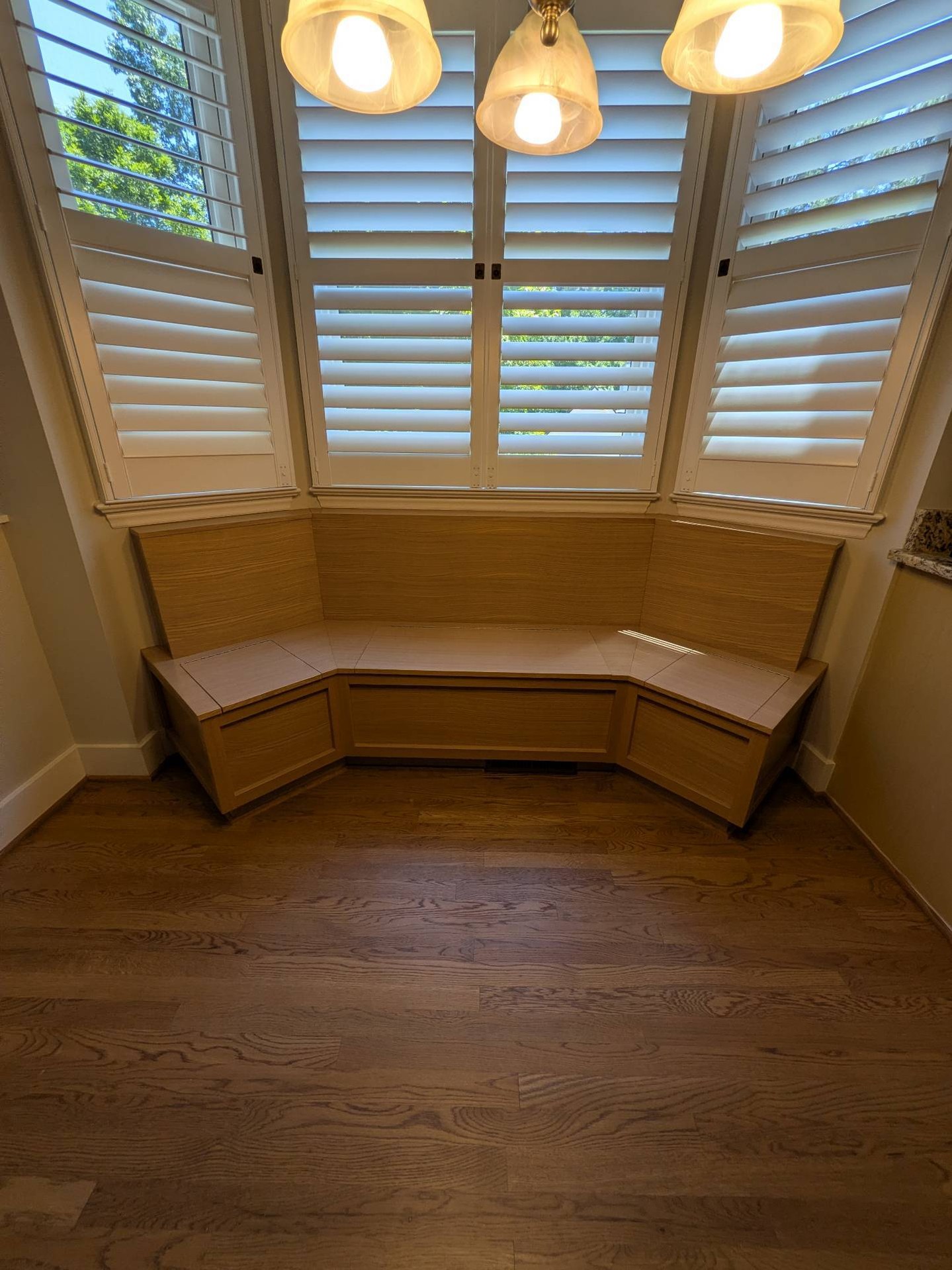 Not every custom project needs to cover an entire wall.
Sometimes it's one awkward spot that needs a better answer.
A built-in bench can add seating, storage and architectural interest without overwhelming the room—and it's one of those projects where a few inches can make a surprisingly big difference.