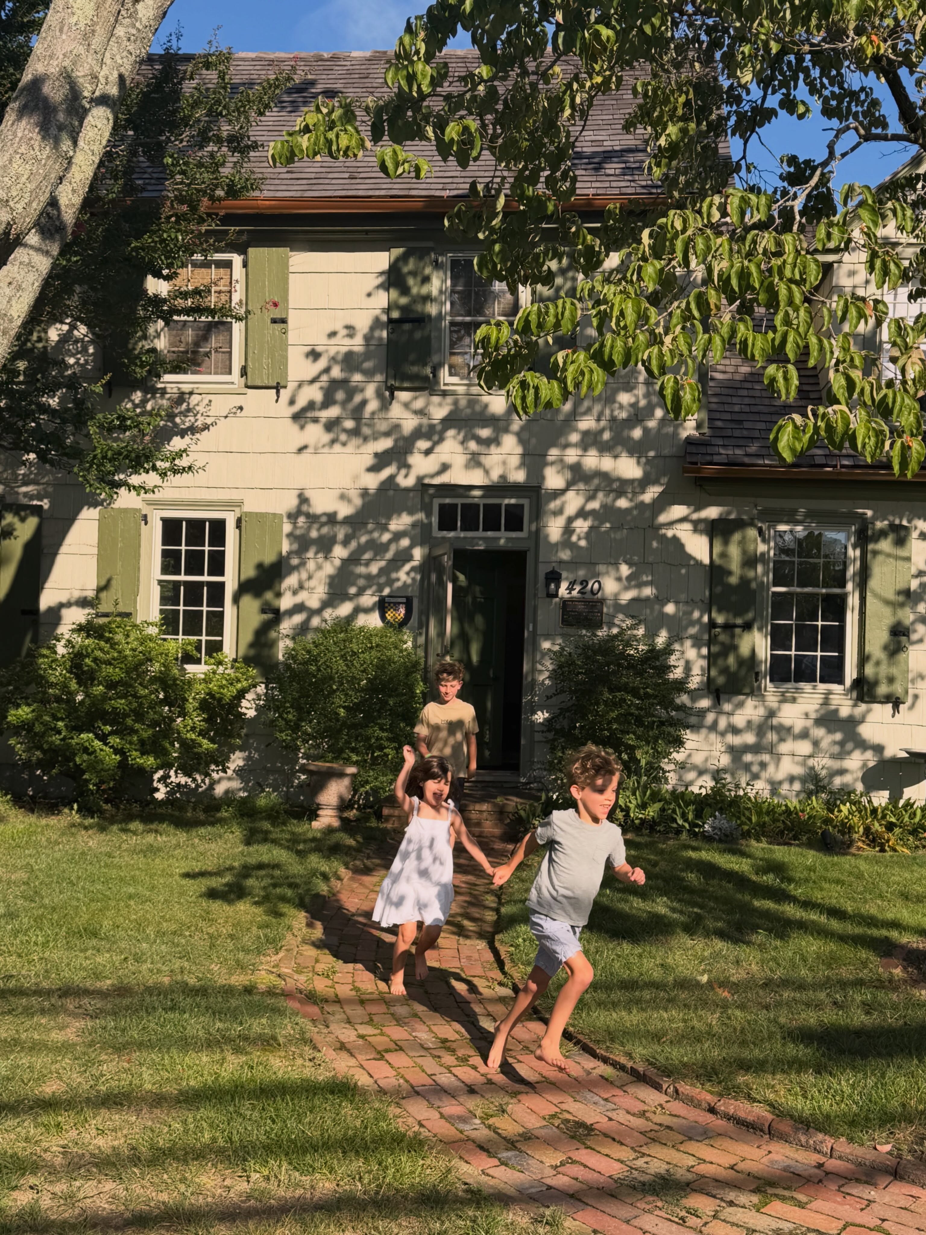 After nearly a decade of designing homes for others, a dream came true for us over the summer…we found a house we could really make our home ❤️ One with a few centuries of history, original character, and a beautiful setting just a few blocks from the street where I spent my earliest years. She’s a little overgrown, a bit rough around some edges, small in places, but with hidden treasures and beautiful bones we can slowly make our own over time. As our youngest son said to us over breakfast, this house is magical with a capital “M” ✨
For now, we’ve just moved in some furniture while we settle in and start dreaming and scheming, but I can’t wait to share bits of the projects we take on over time. If you are into historic colonial homes, there will be lots to see ✨